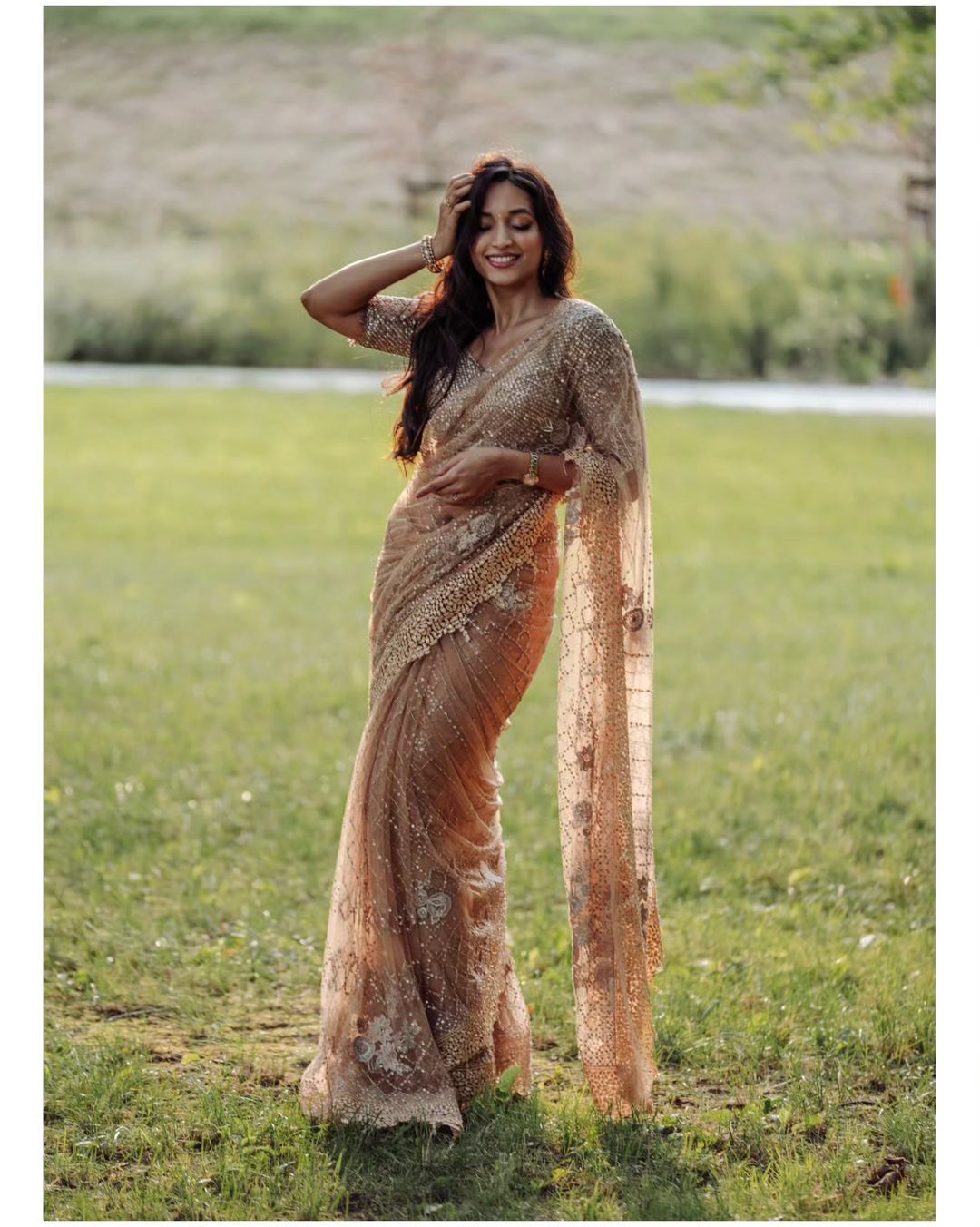 Ceremony Wear Sequence Work Beige Color Net Saree