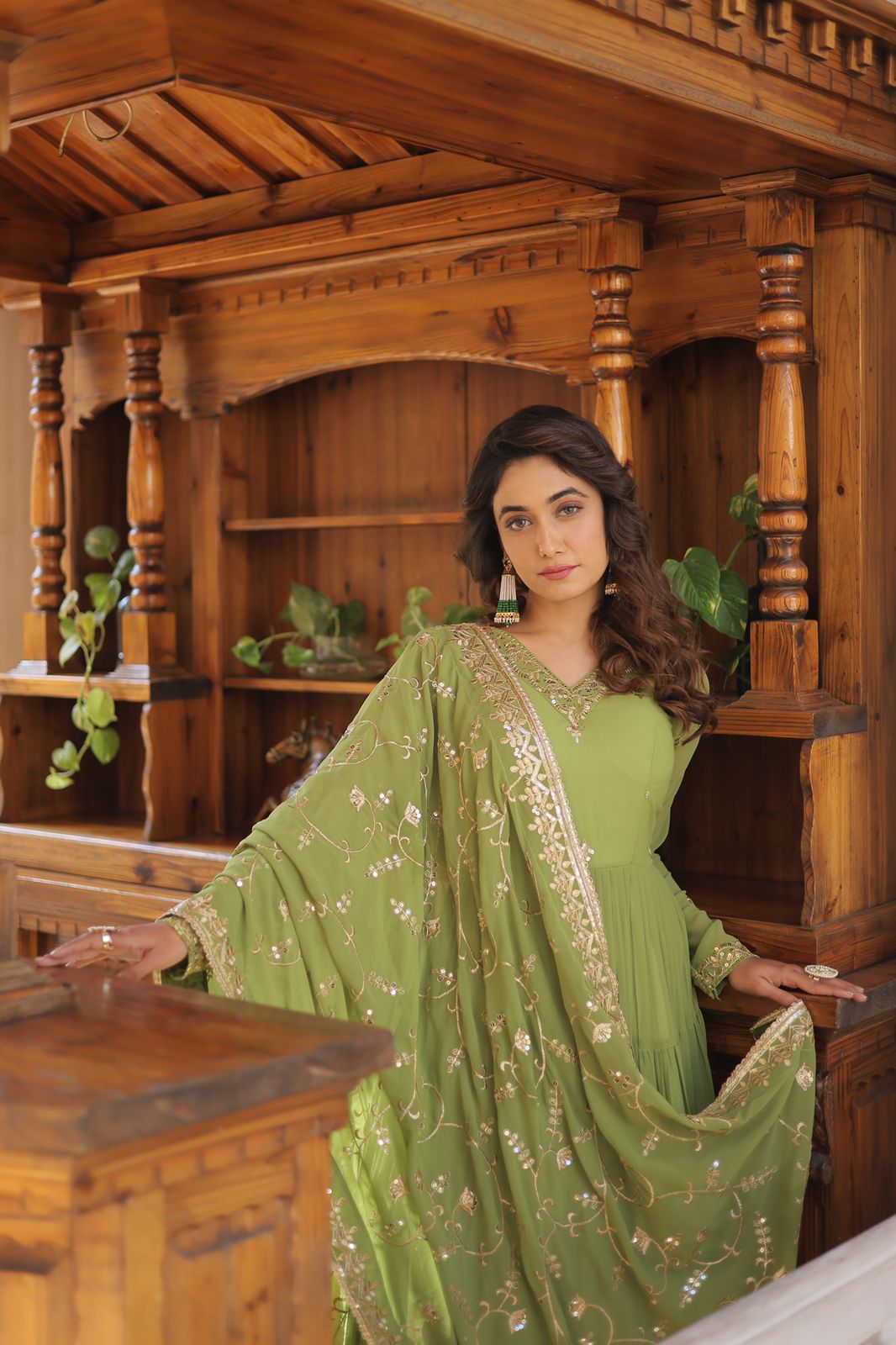 Luxuriant Ruffle Parrot Green Gown With Work Dupatta