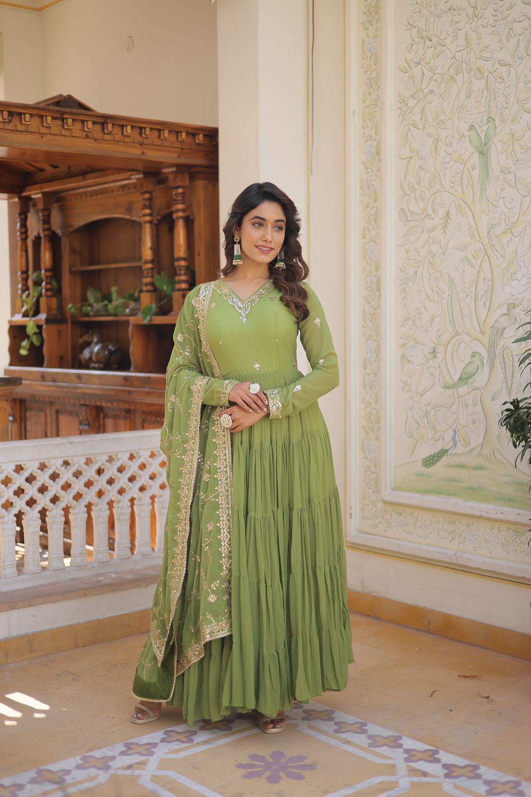 Luxuriant Ruffle Parrot Green Gown With Work Dupatta