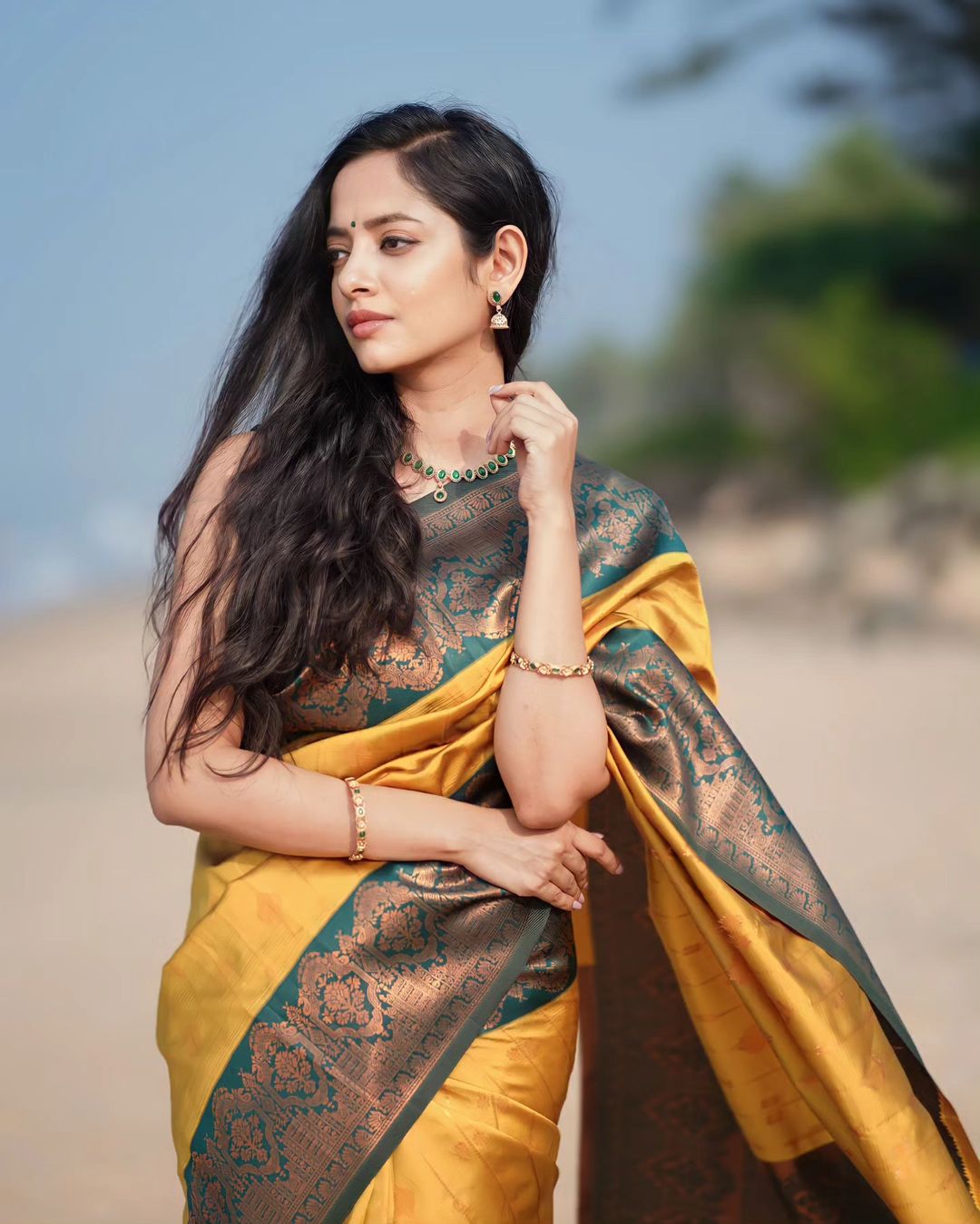 Soft Lichi Silk Yellow Color With Sky Blue Border Saree