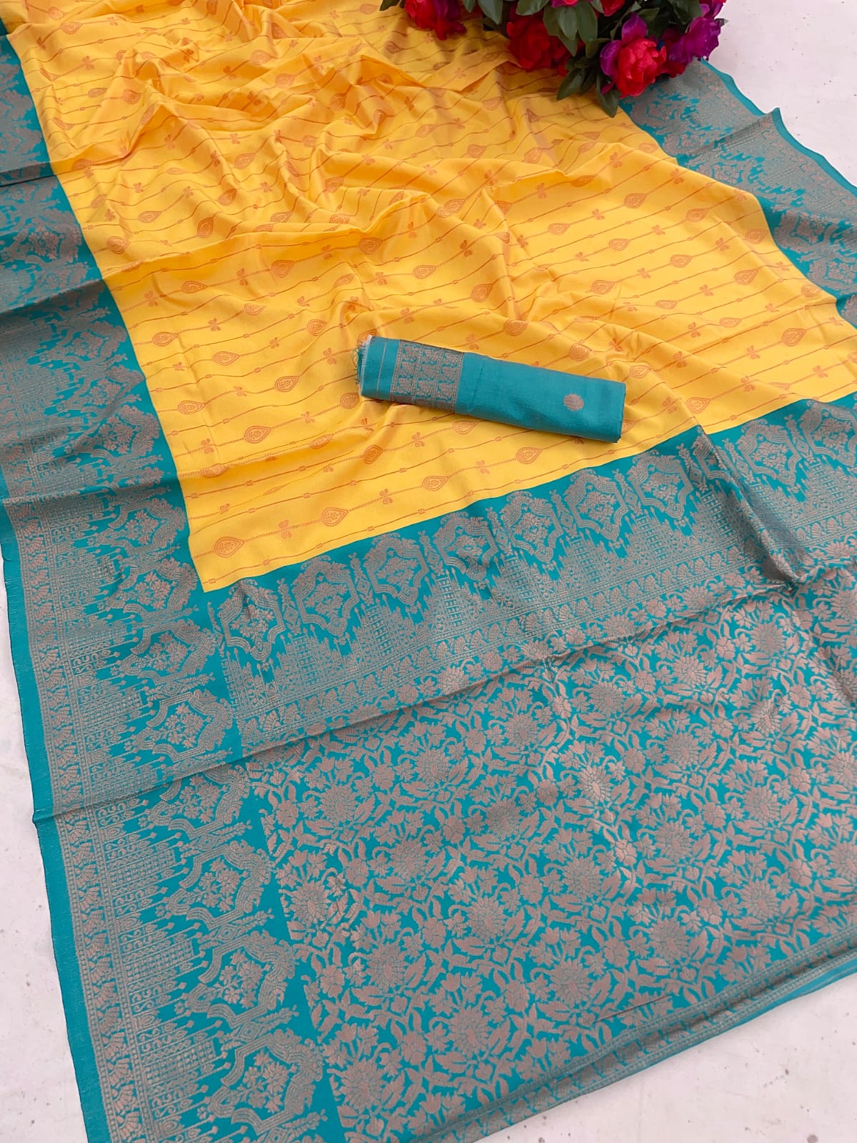 Soft Lichi Silk Yellow Color With Sky Blue Border Saree