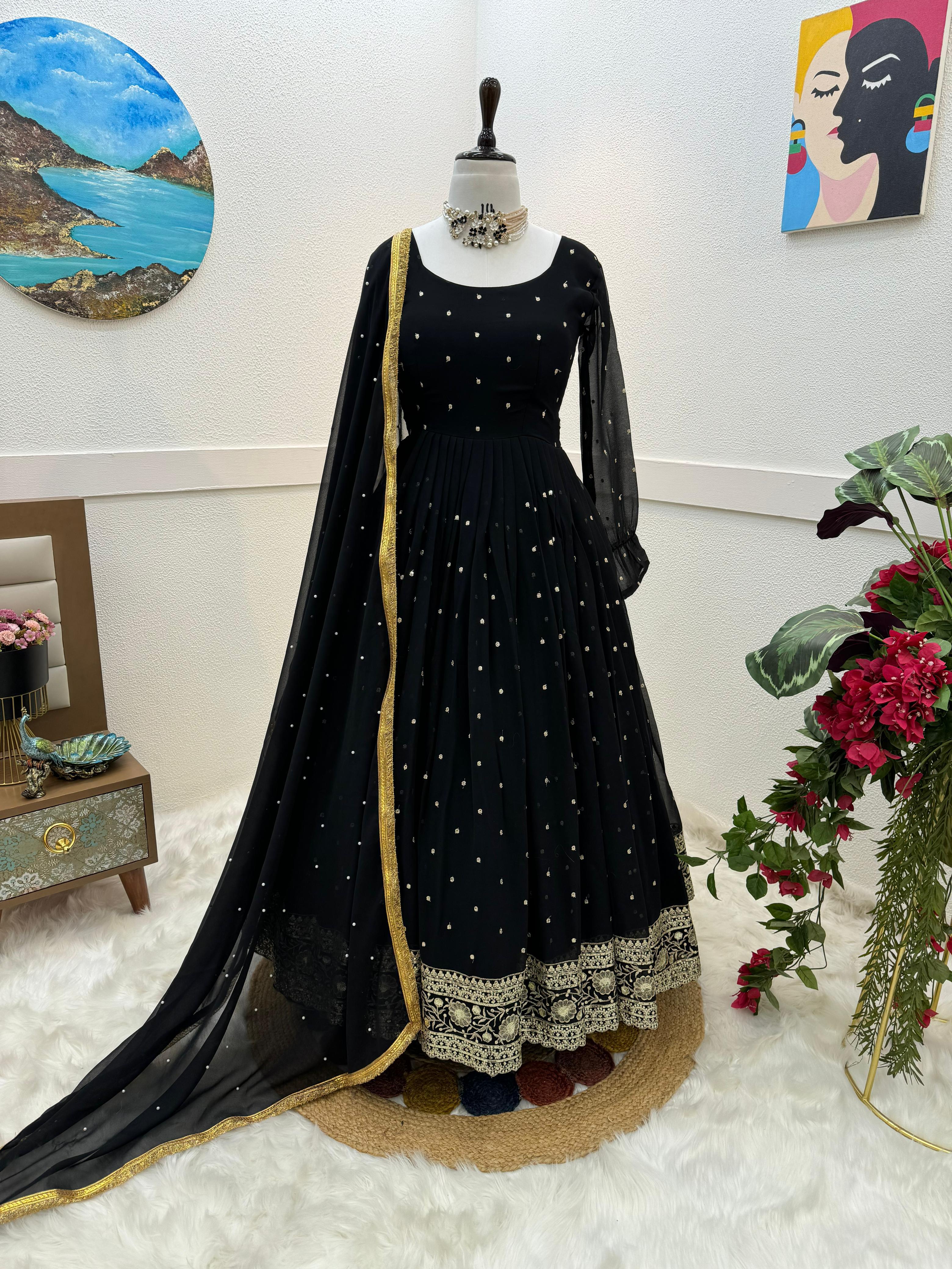 Admiring Black Color Embroidery Work Gown