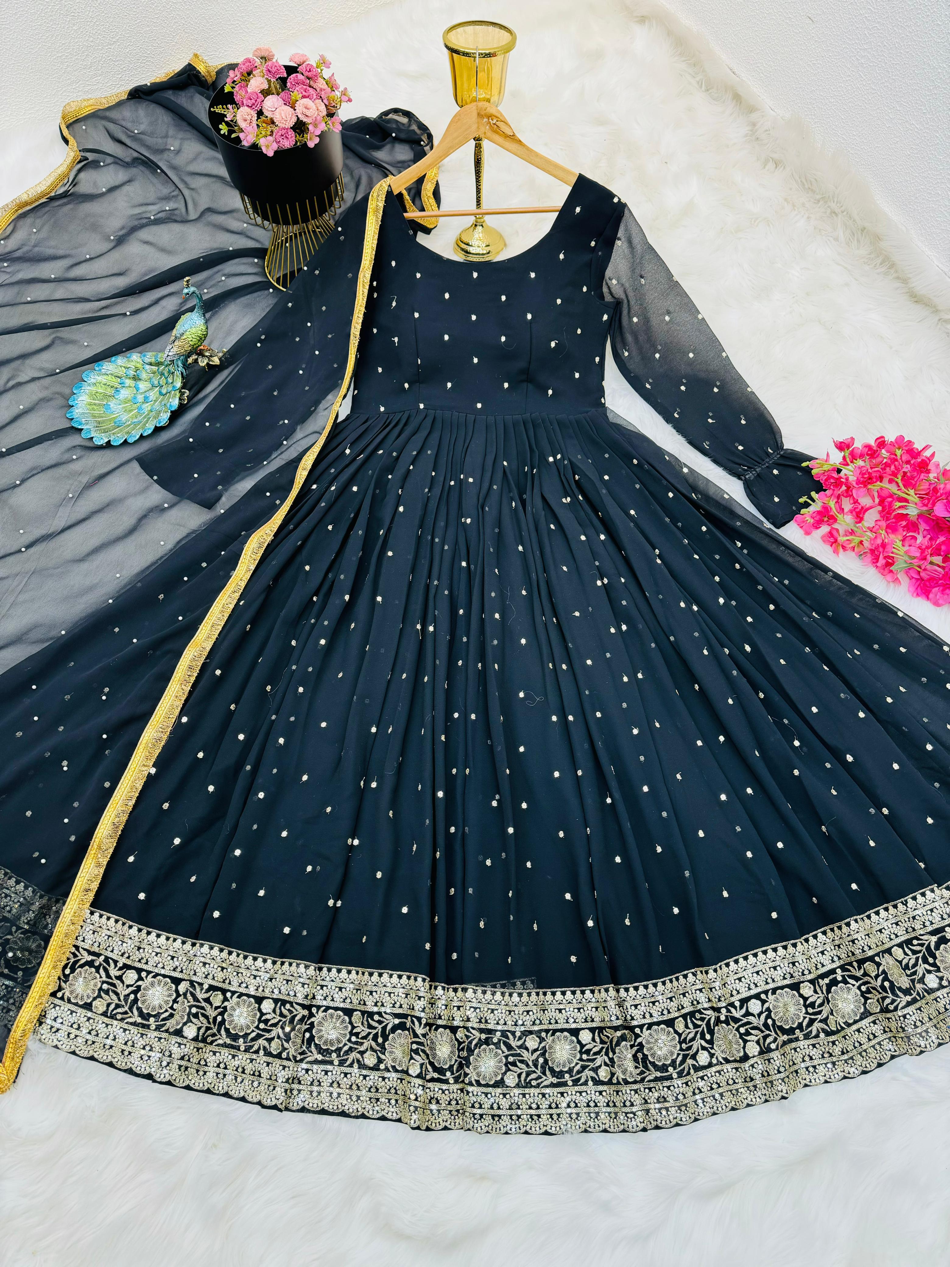 Admiring Black Color Embroidery Work Gown