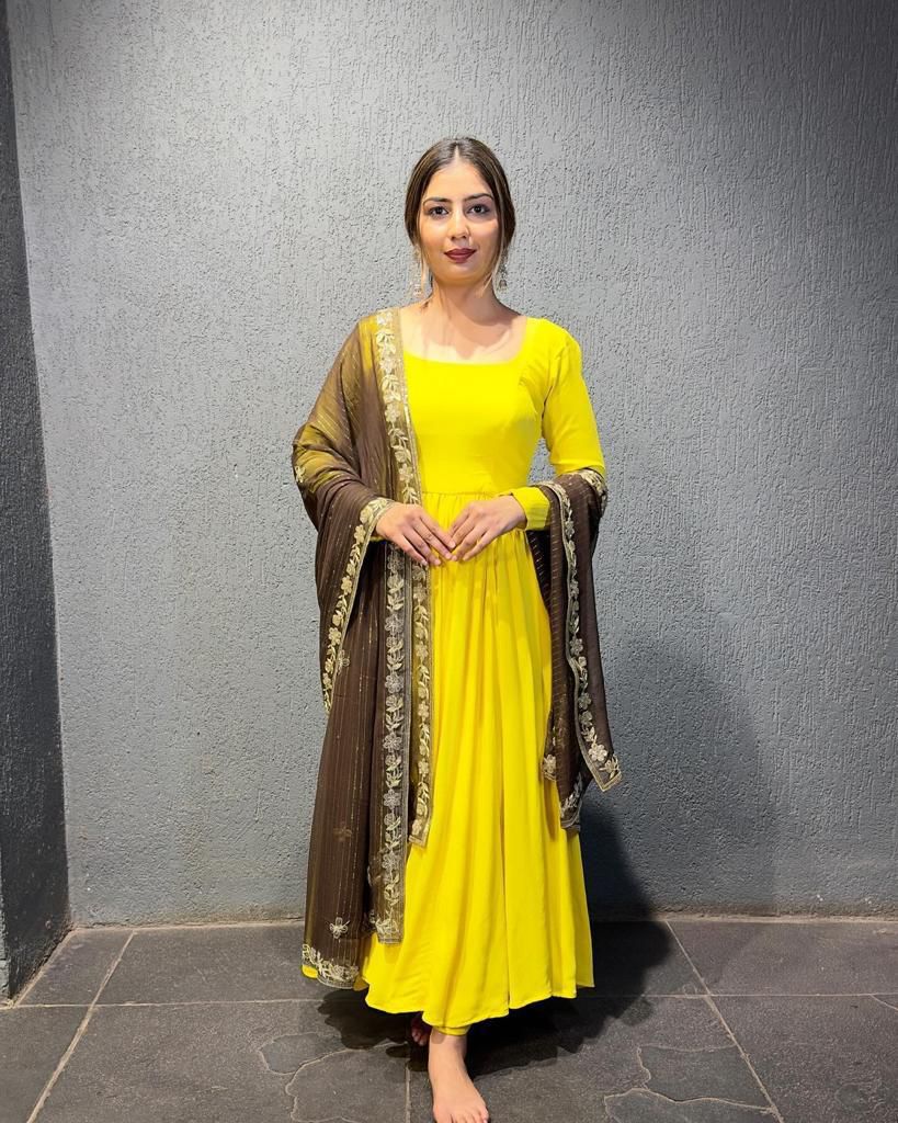 Opulent Yellow Color Dori Pattern Gown With Brown Dupatta