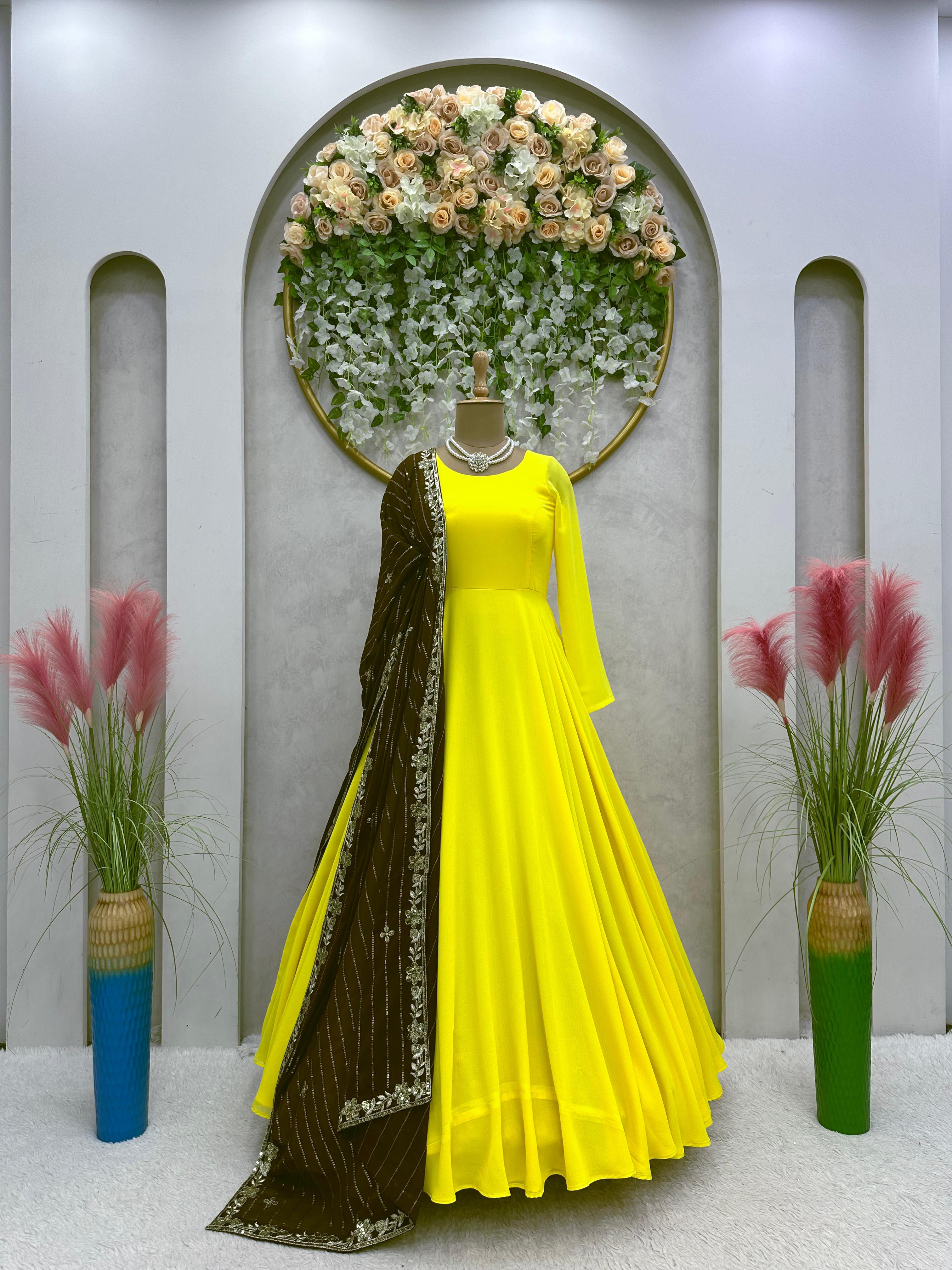 Opulent Yellow Color Dori Pattern Gown With Brown Dupatta