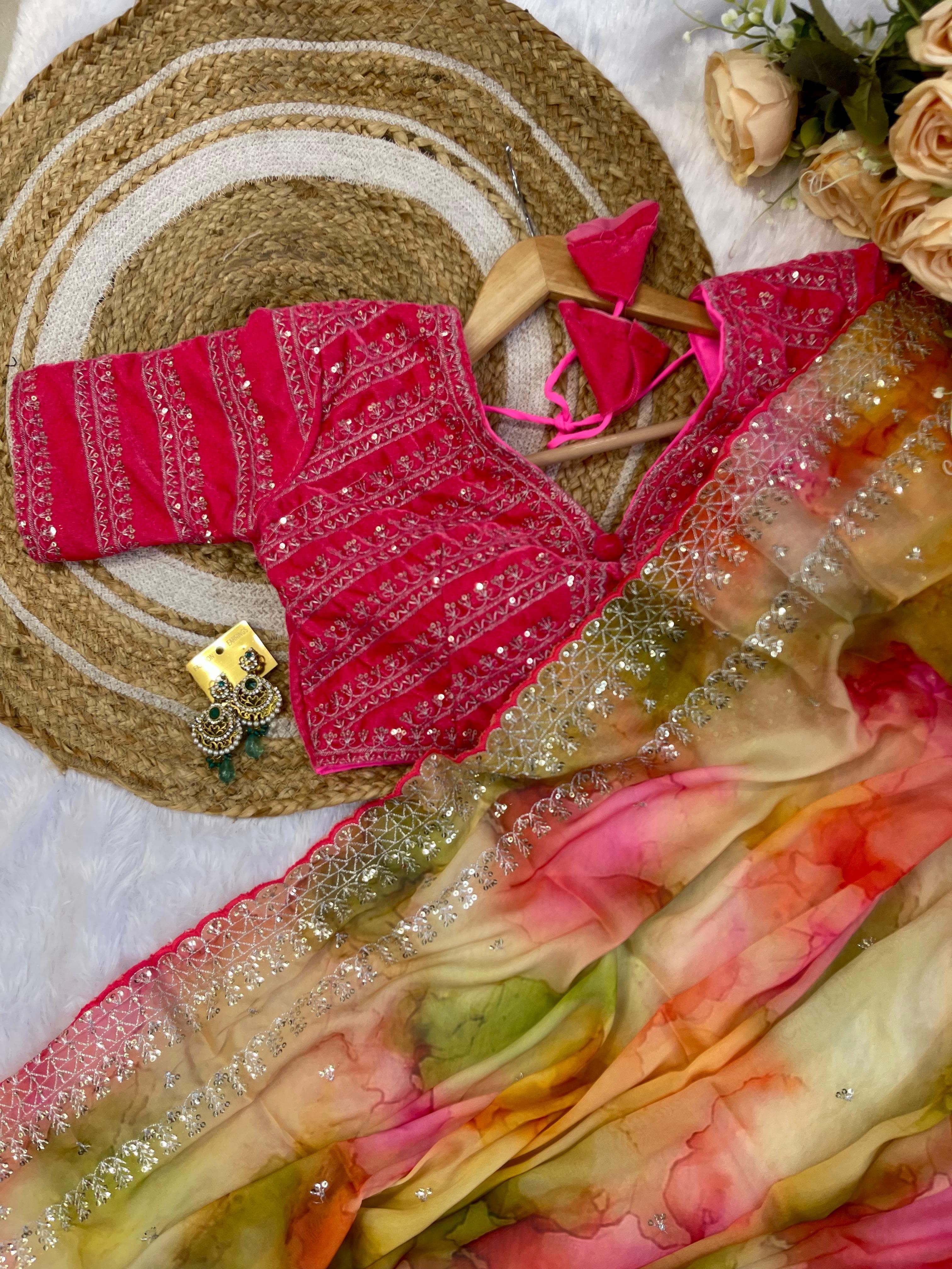 Gorgeous Multi Printed Saree With Red Work Blouse