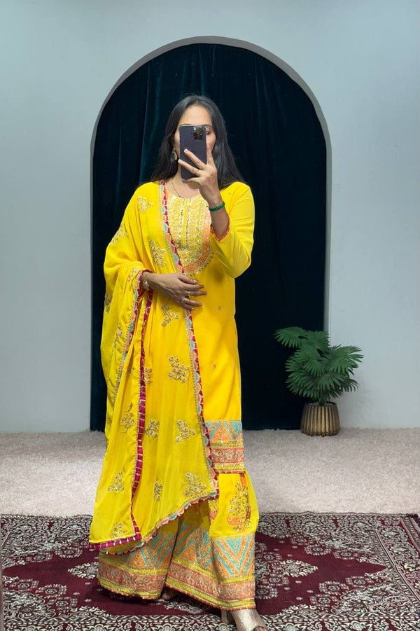 Mirror With Embroidery Work Yellow Color Sharara Suit