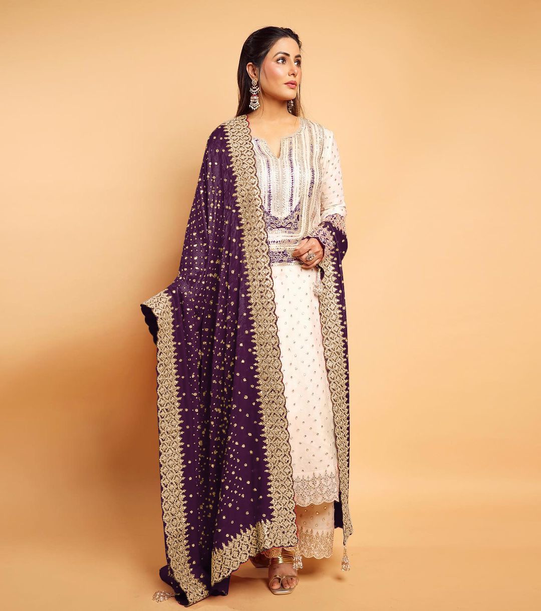 Celebrity Wear White Palazzo Suit With Purple Dupatta