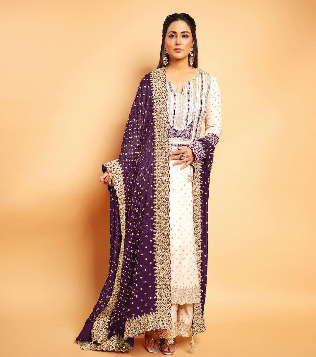 Celebrity Wear White Palazzo Suit With Purple Dupatta