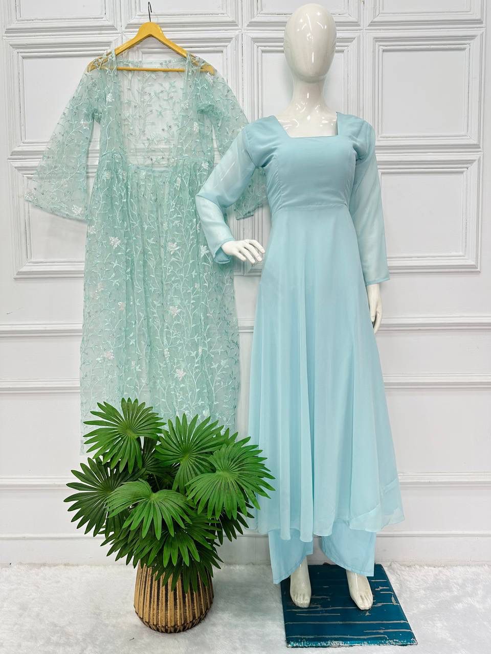 Luxuriant Sky Blue Color Plain Gown Palazzo With Net Shrug