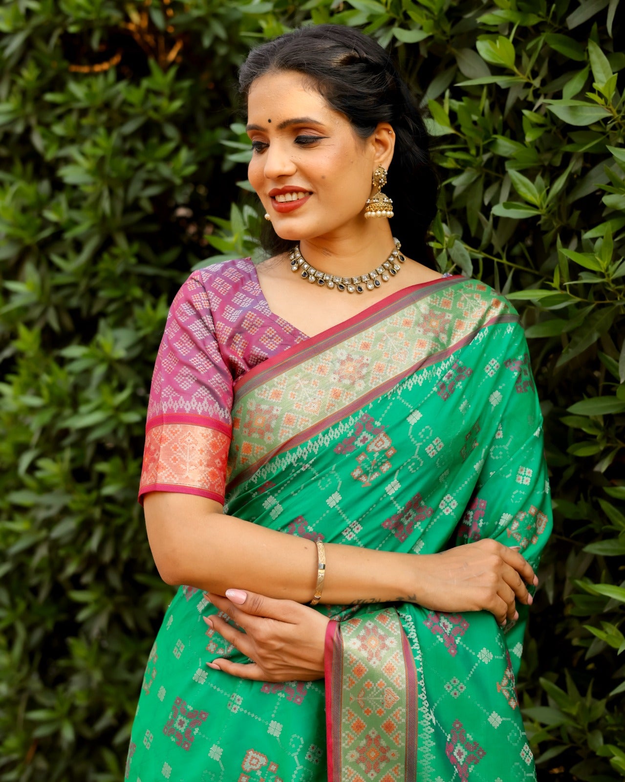 Dazzling Patola Silk Aqua Green Color Kanchi Border Saree