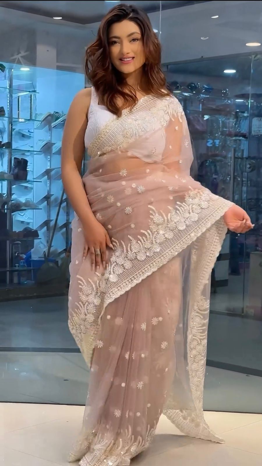 Beautiful Sequins Embroidery Beige Color Net Saree