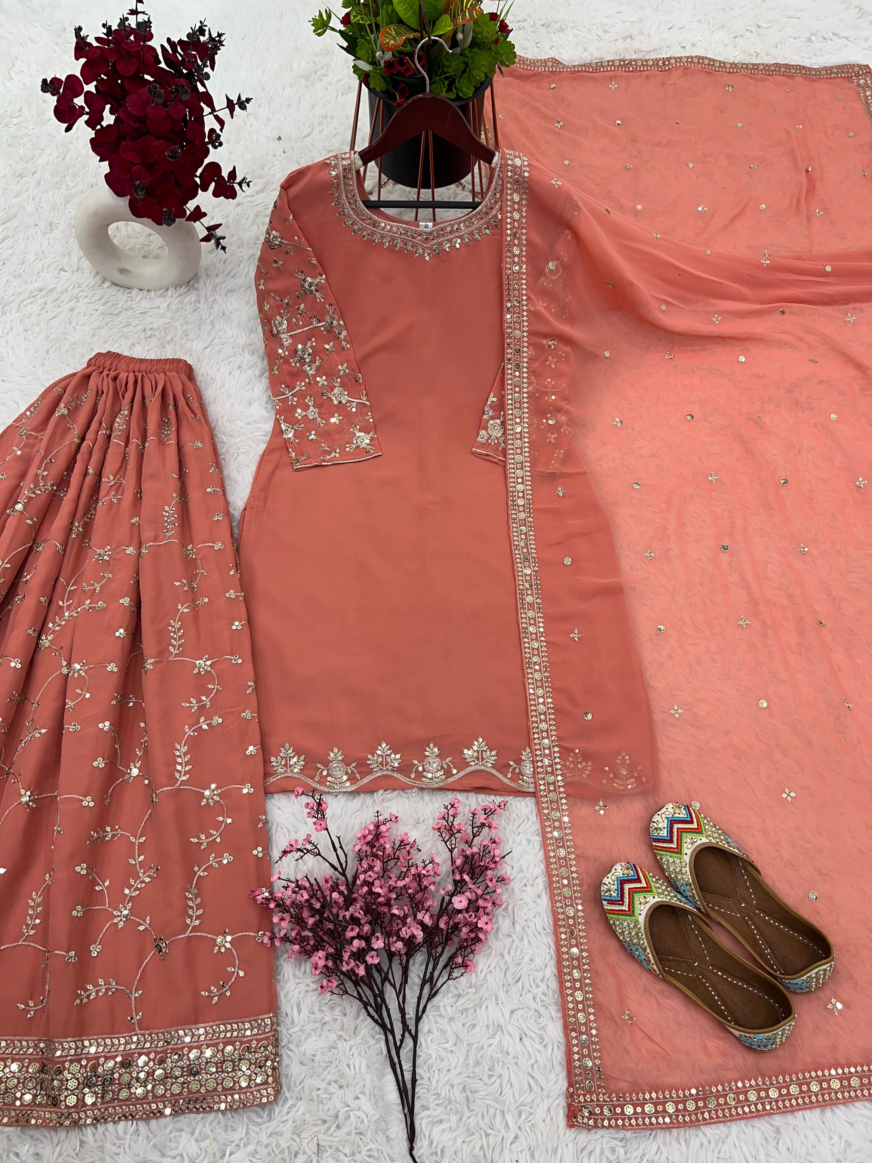 Imposing Embroidery Work Peach Sharara Suit