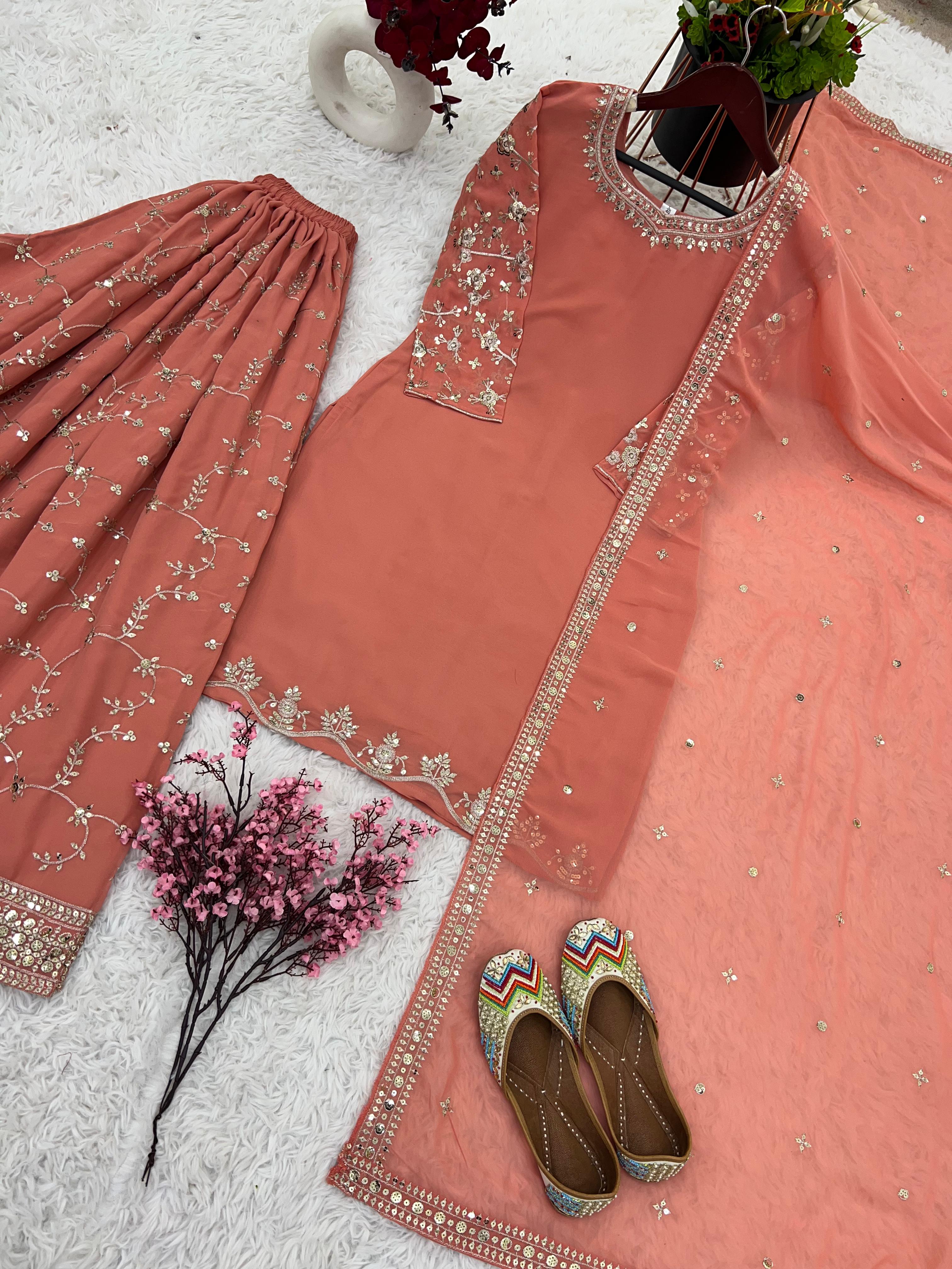 Imposing Embroidery Work Peach Sharara Suit