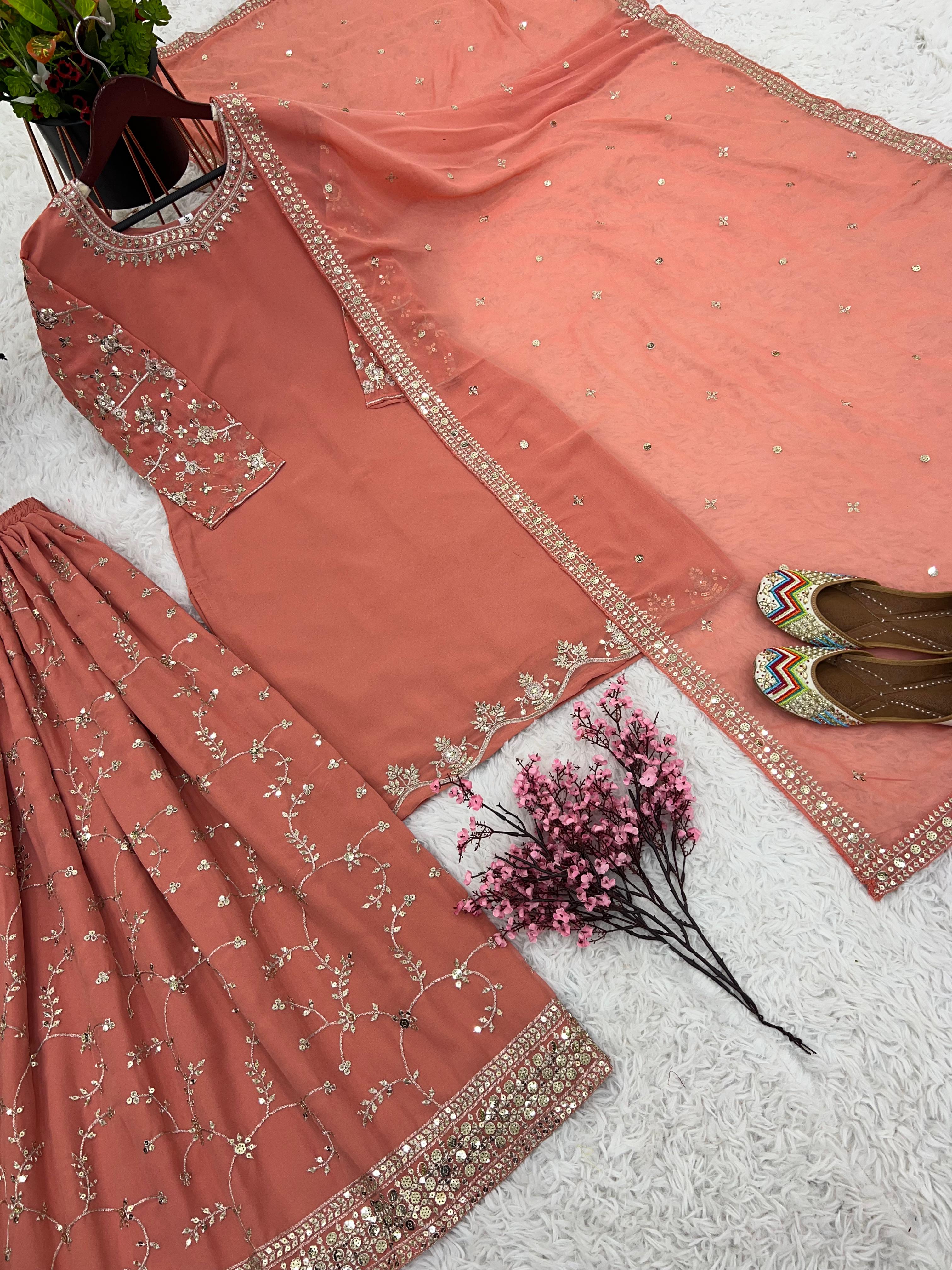 Imposing Embroidery Work Peach Sharara Suit