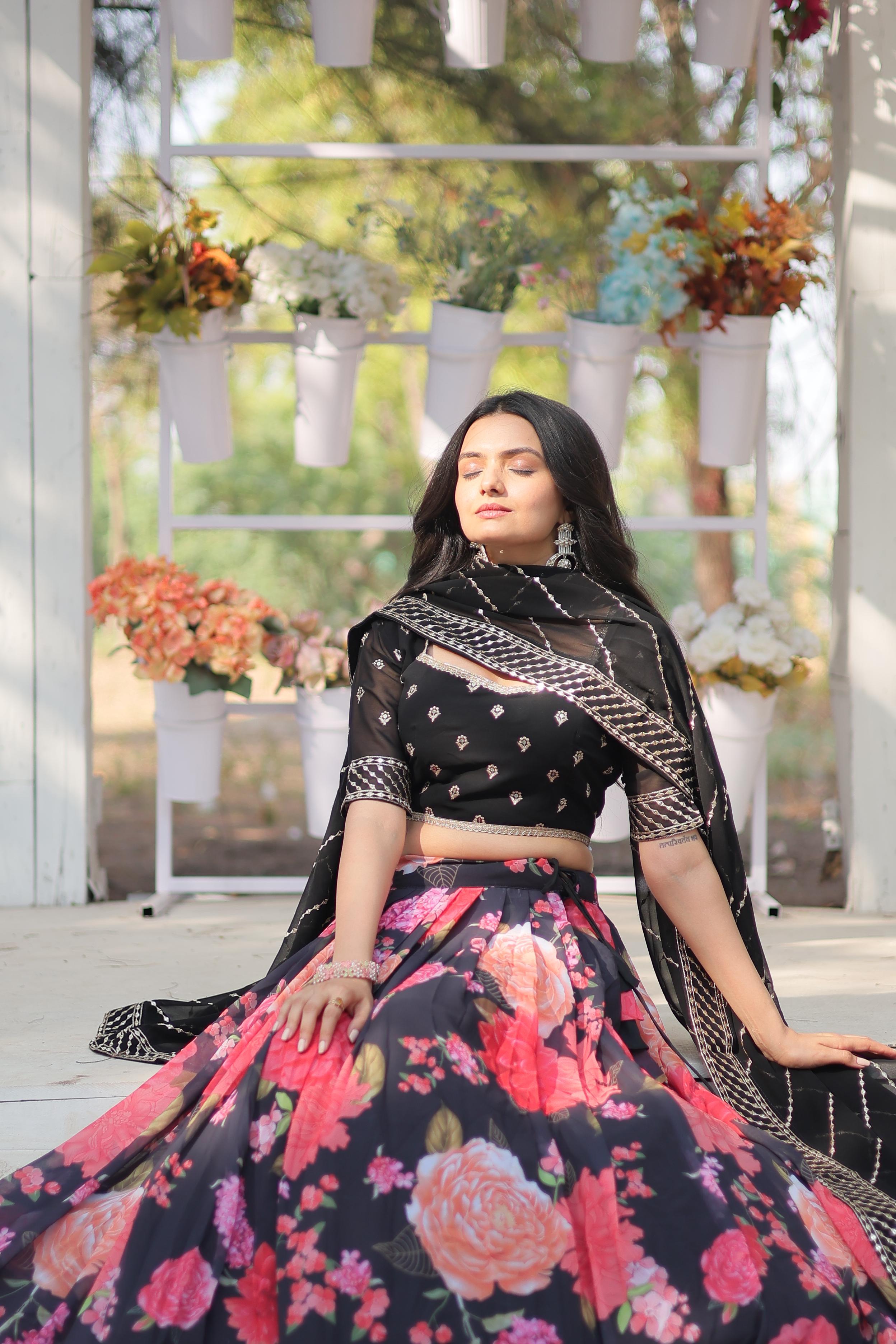 Exquisite Collection Black And Flower Digital Printed Georgette Lehenga Choli