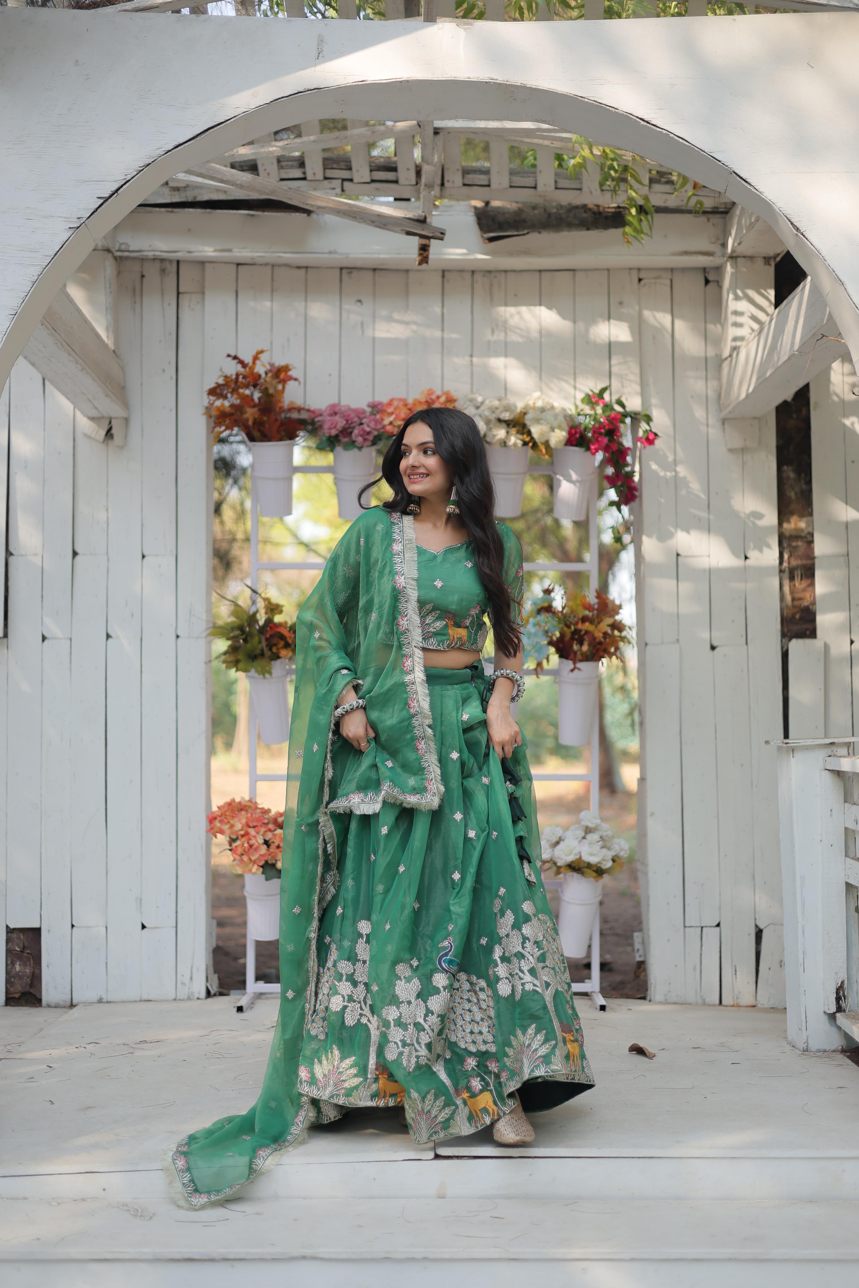 Elegant Light Green Color Heavy Sequins And Thread Embroidered Work Designer Lehenga Choli