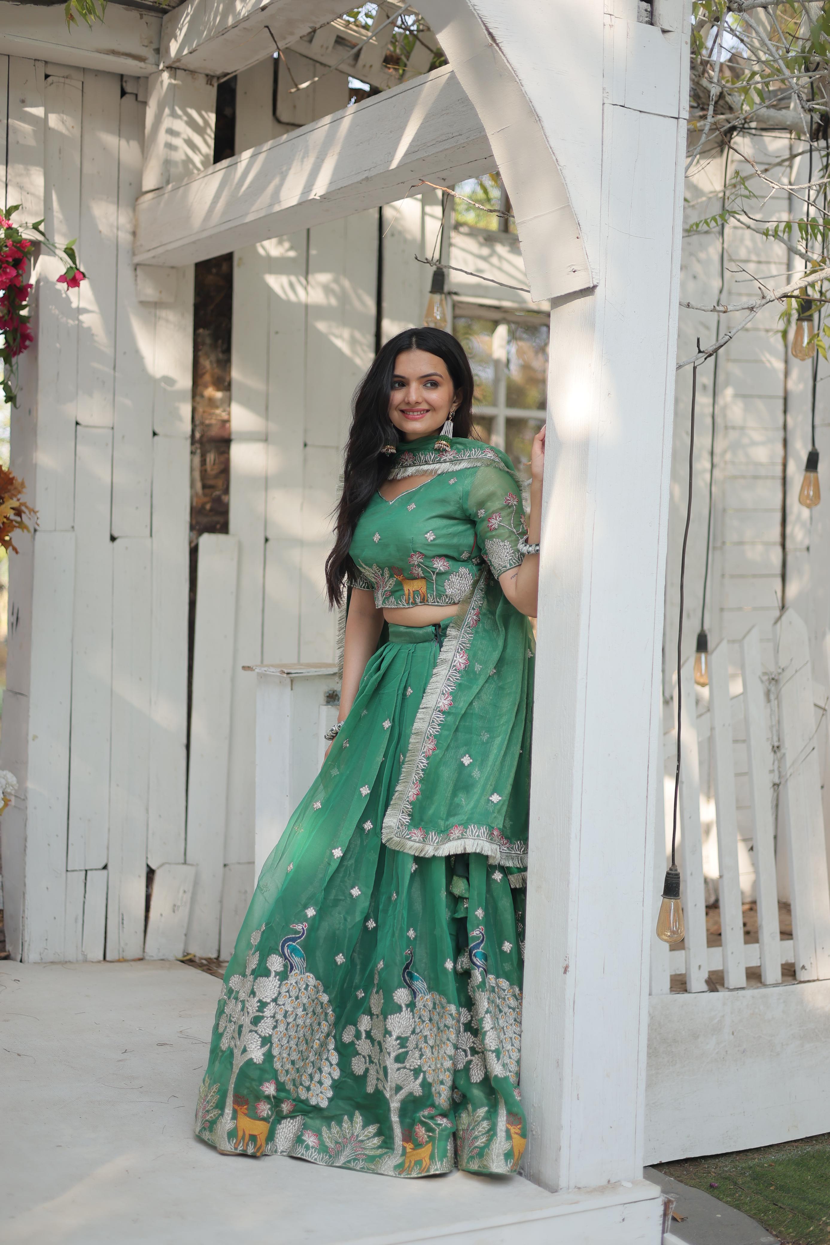 Elegant Light Green Color Heavy Sequins And Thread Embroidered Work Designer Lehenga Choli