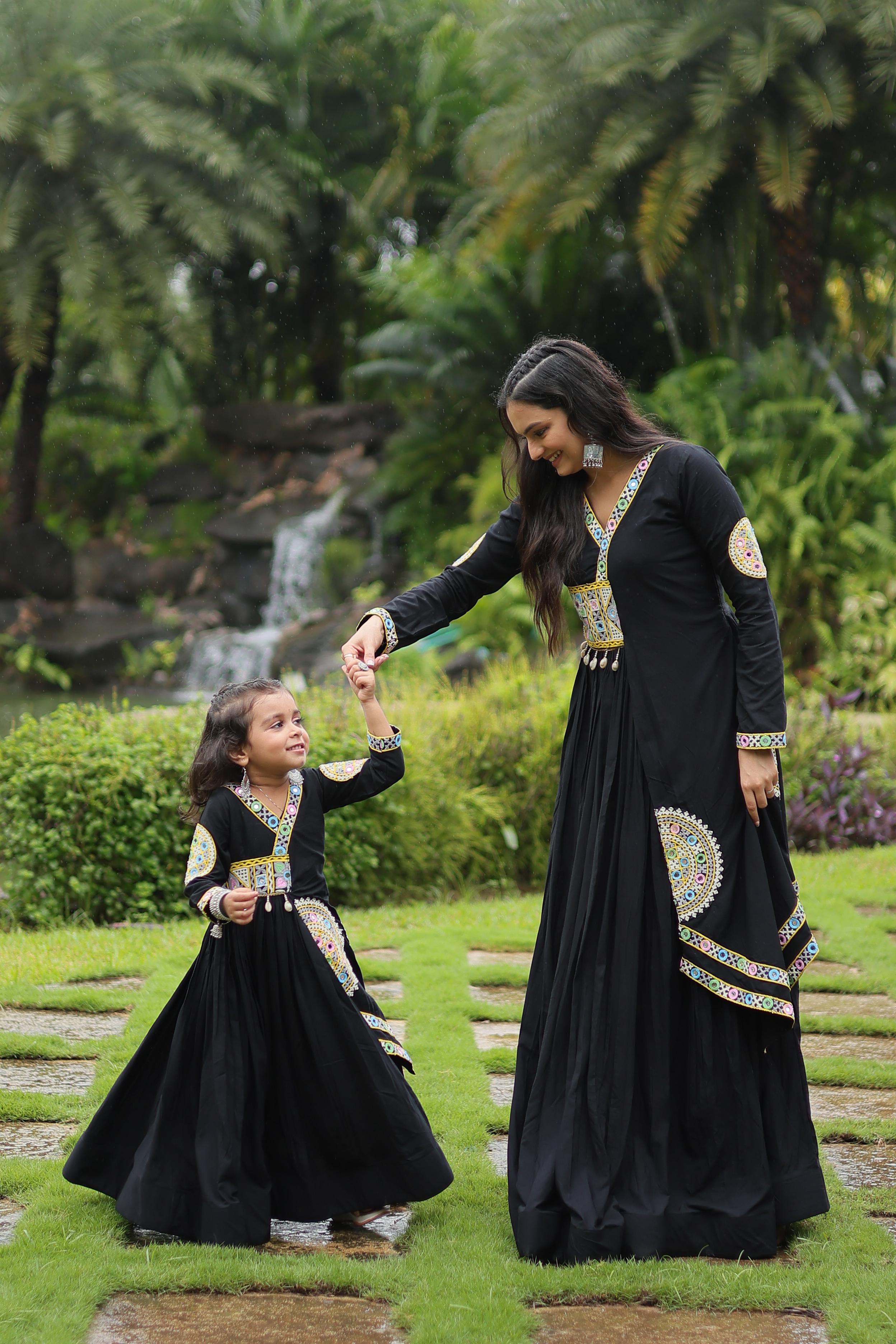 Traditional Wear Black Color Rayon With Kutchi Gamthi Lace Work Navratri Special Mother And Daughter Gown