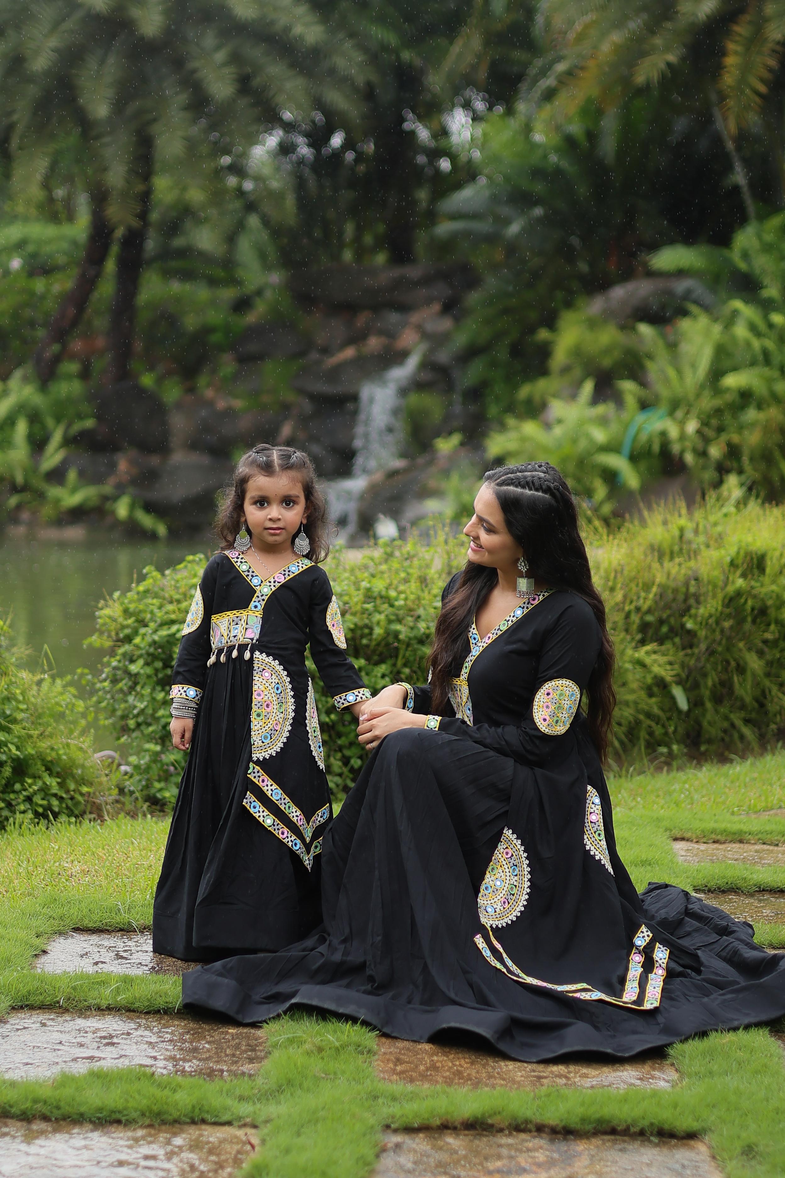 Traditional Wear Black Color Rayon With Kutchi Gamthi Lace Work Navratri Special Mother And Daughter Gown