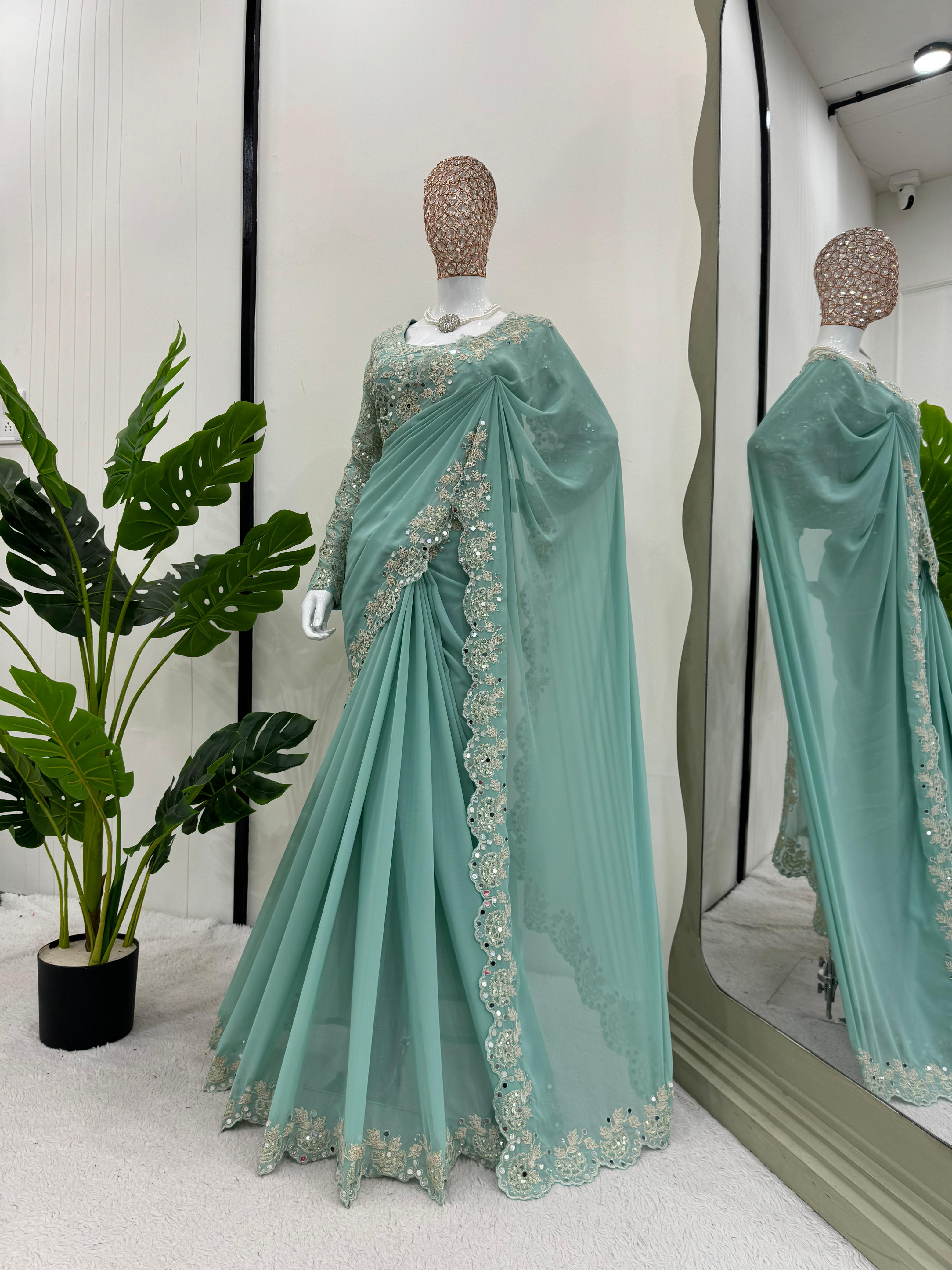 Eyes Catching Sky Blue Faux Georgette Coding And Sequence With Real Mirror Work Designer Saree