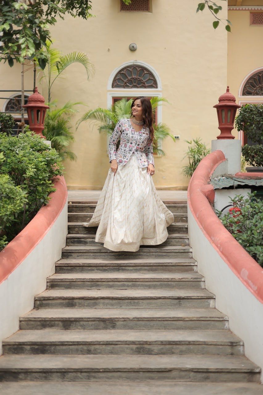 Trending Fashionable Off White Co-Ord Set With Rich Thread Sequins Embroidered Work Blouse And Dyable Viscose Lehenga