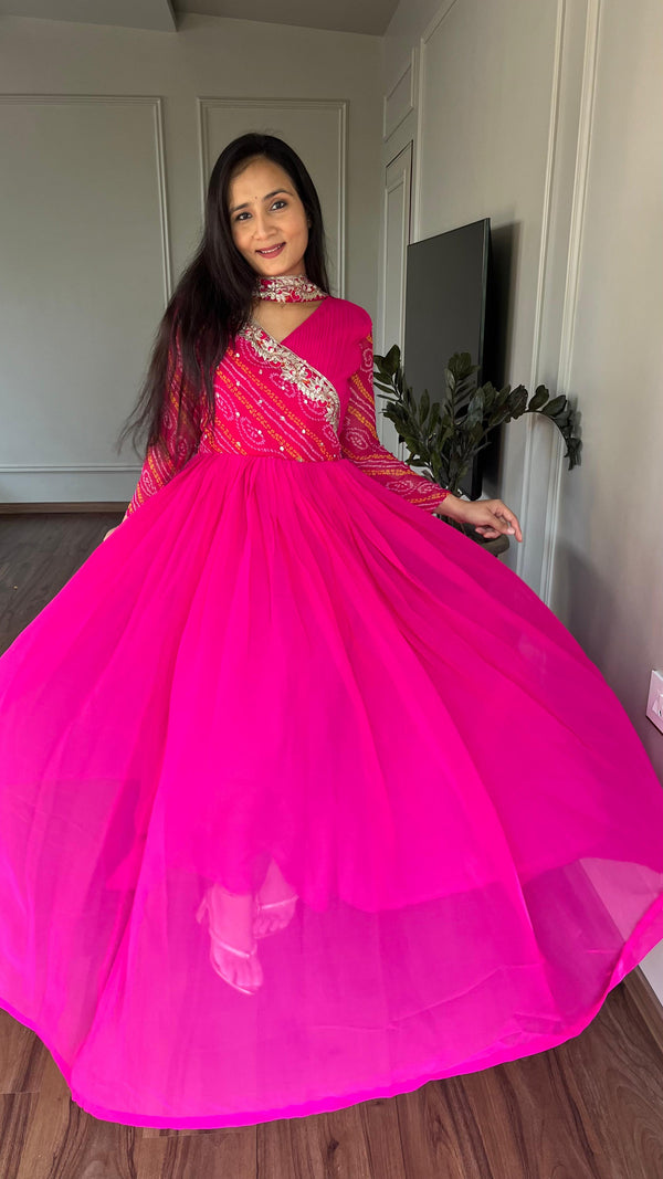 Luxuriant Pink Color Pure Bandhej With Faux Georgette And Sequence Embroidery Work Beautiful Gown