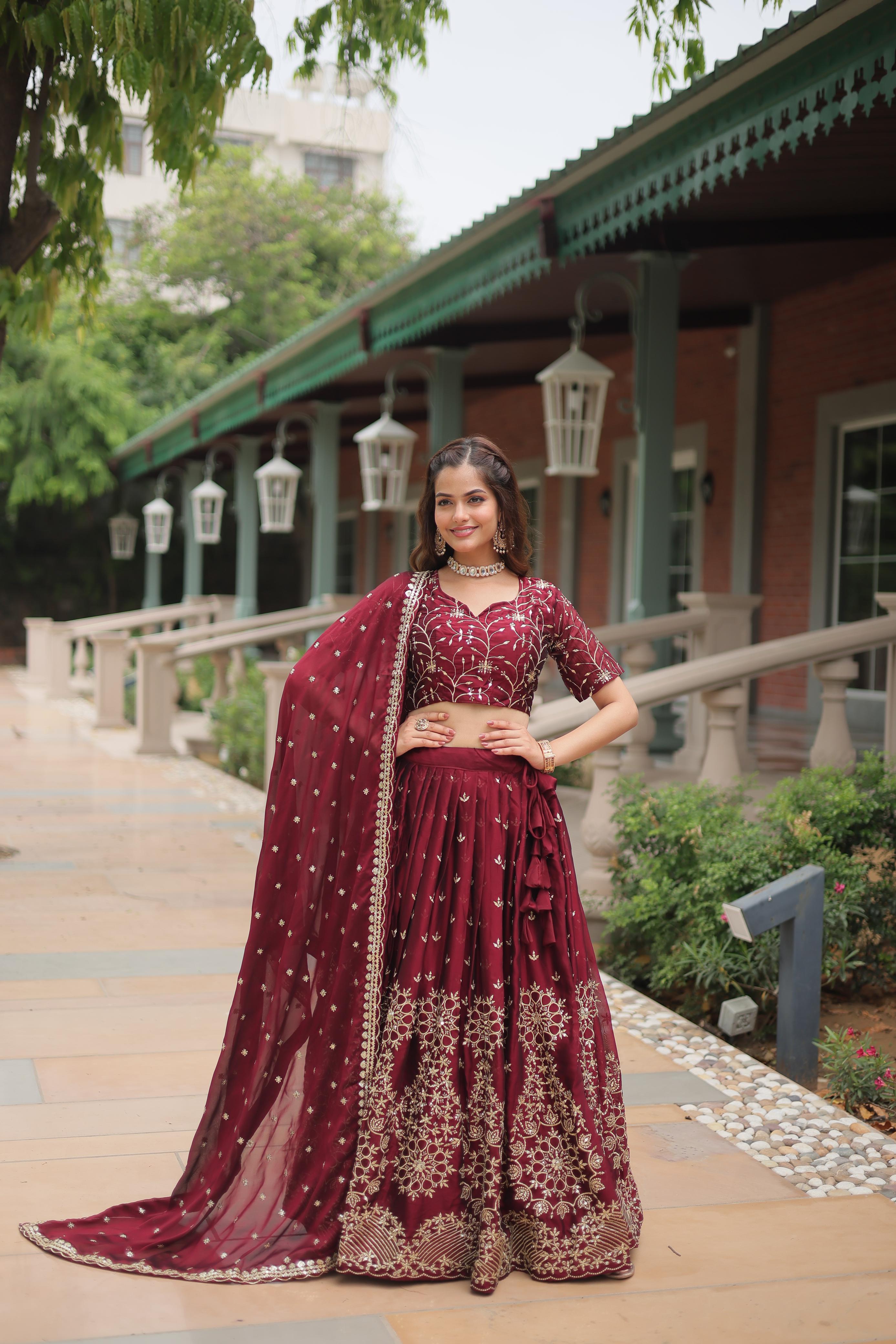 Party Wear Maroon Color Rangoli Silk With Heavy Sequins And Thread Embroidered Work Beautiful Lehenga Choli