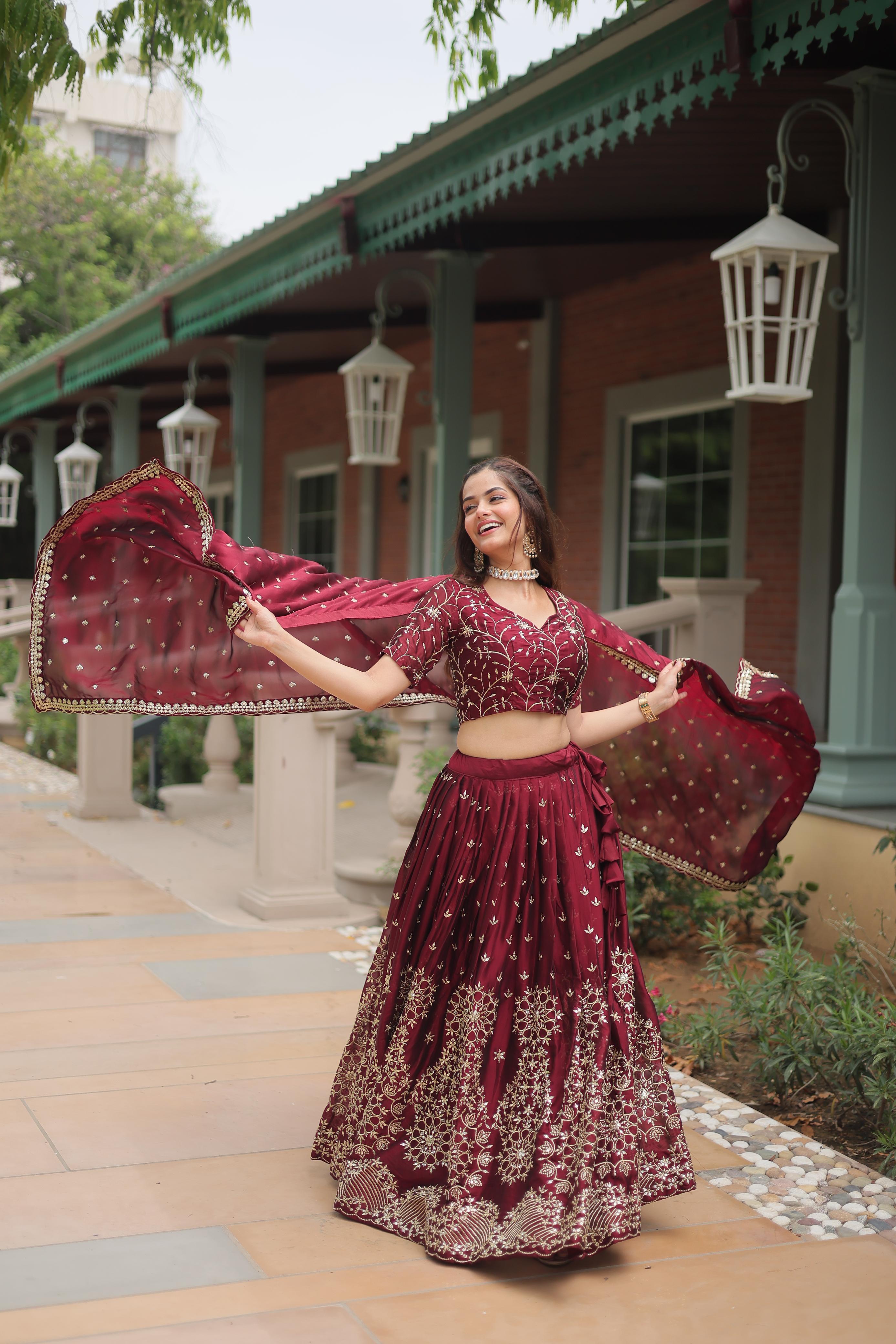 Party Wear Maroon Color Rangoli Silk With Heavy Sequins And Thread Embroidered Work Beautiful Lehenga Choli