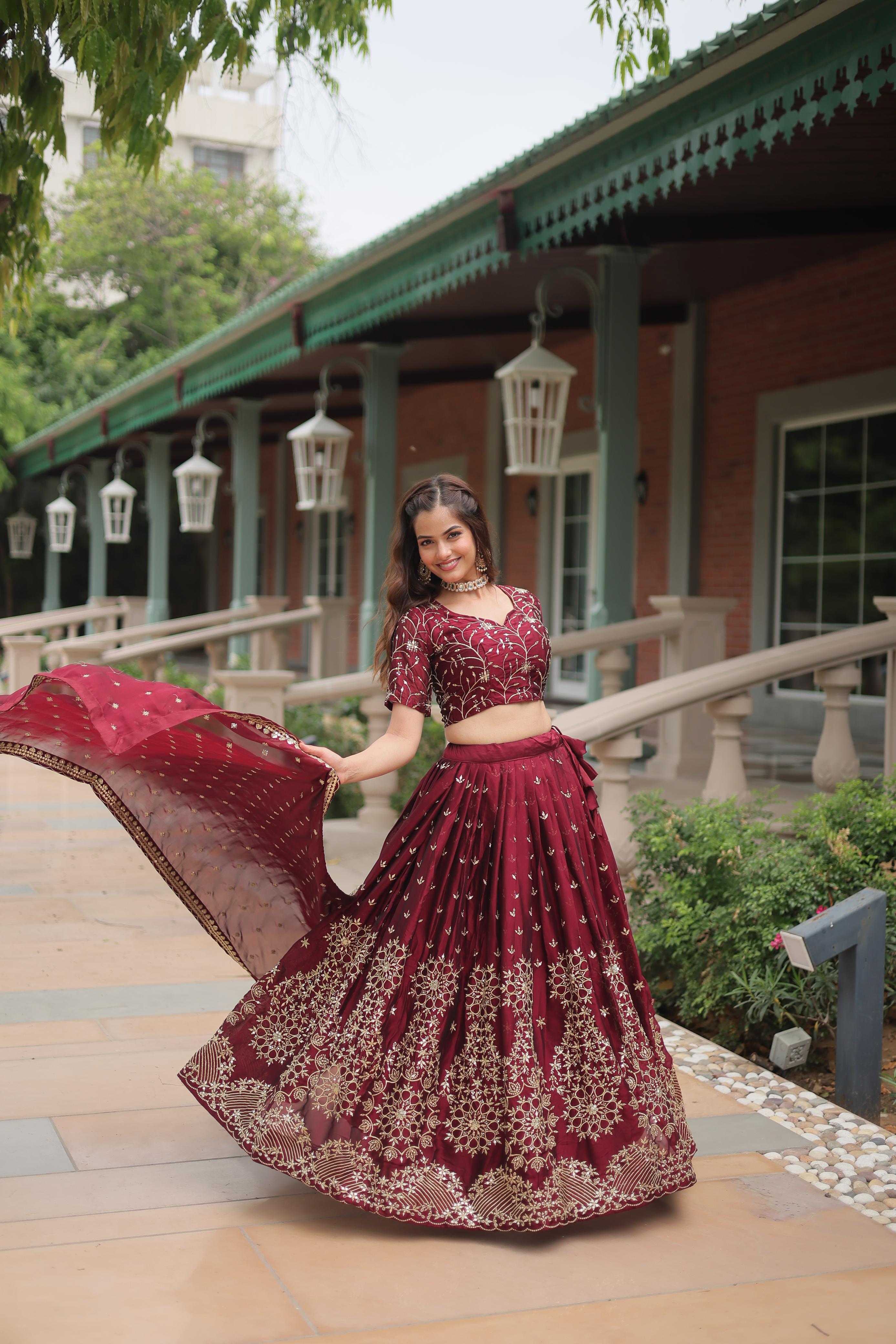 Party Wear Maroon Color Rangoli Silk With Heavy Sequins And Thread Embroidered Work Beautiful Lehenga Choli