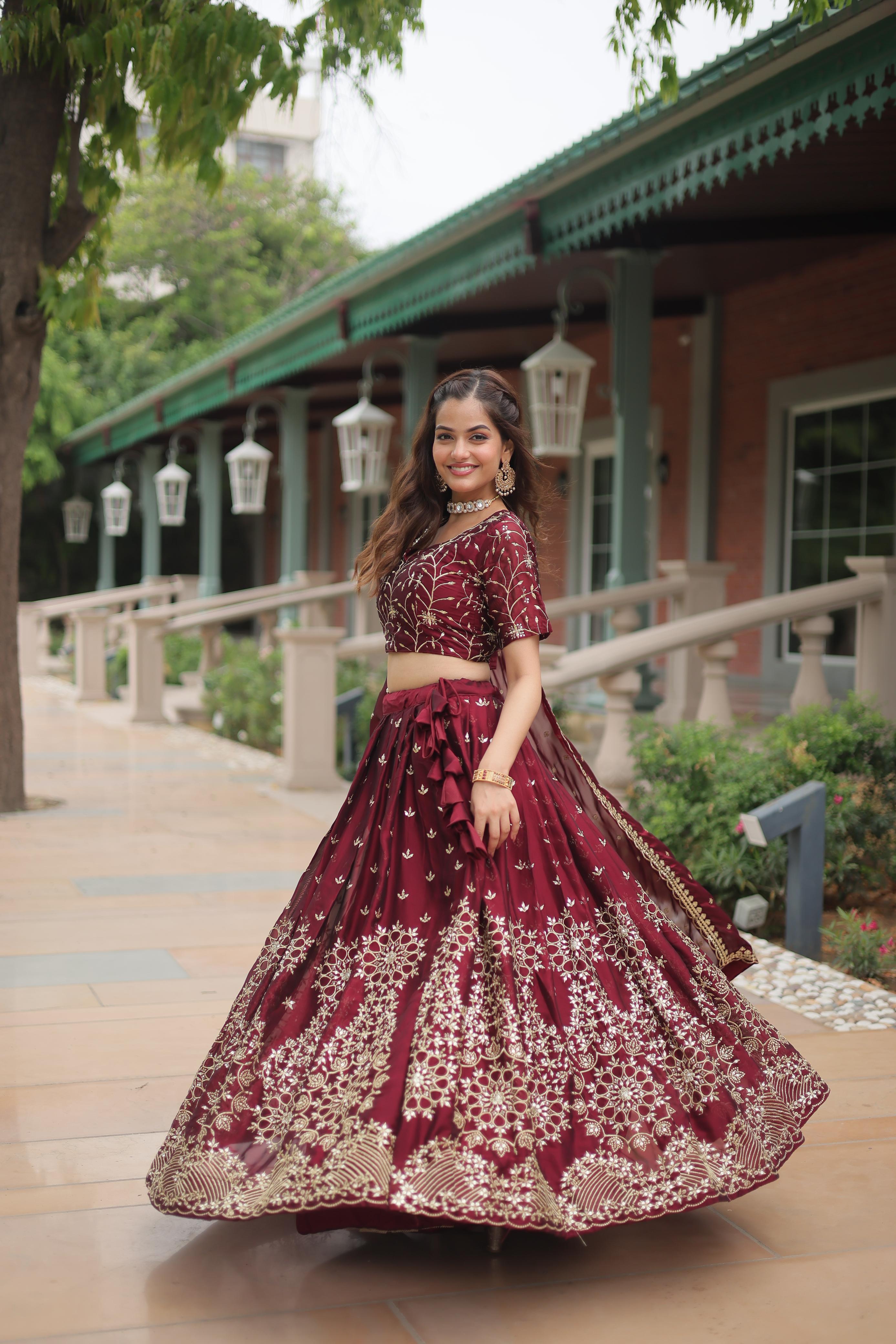 Party Wear Maroon Color Rangoli Silk With Heavy Sequins And Thread Embroidered Work Beautiful Lehenga Choli