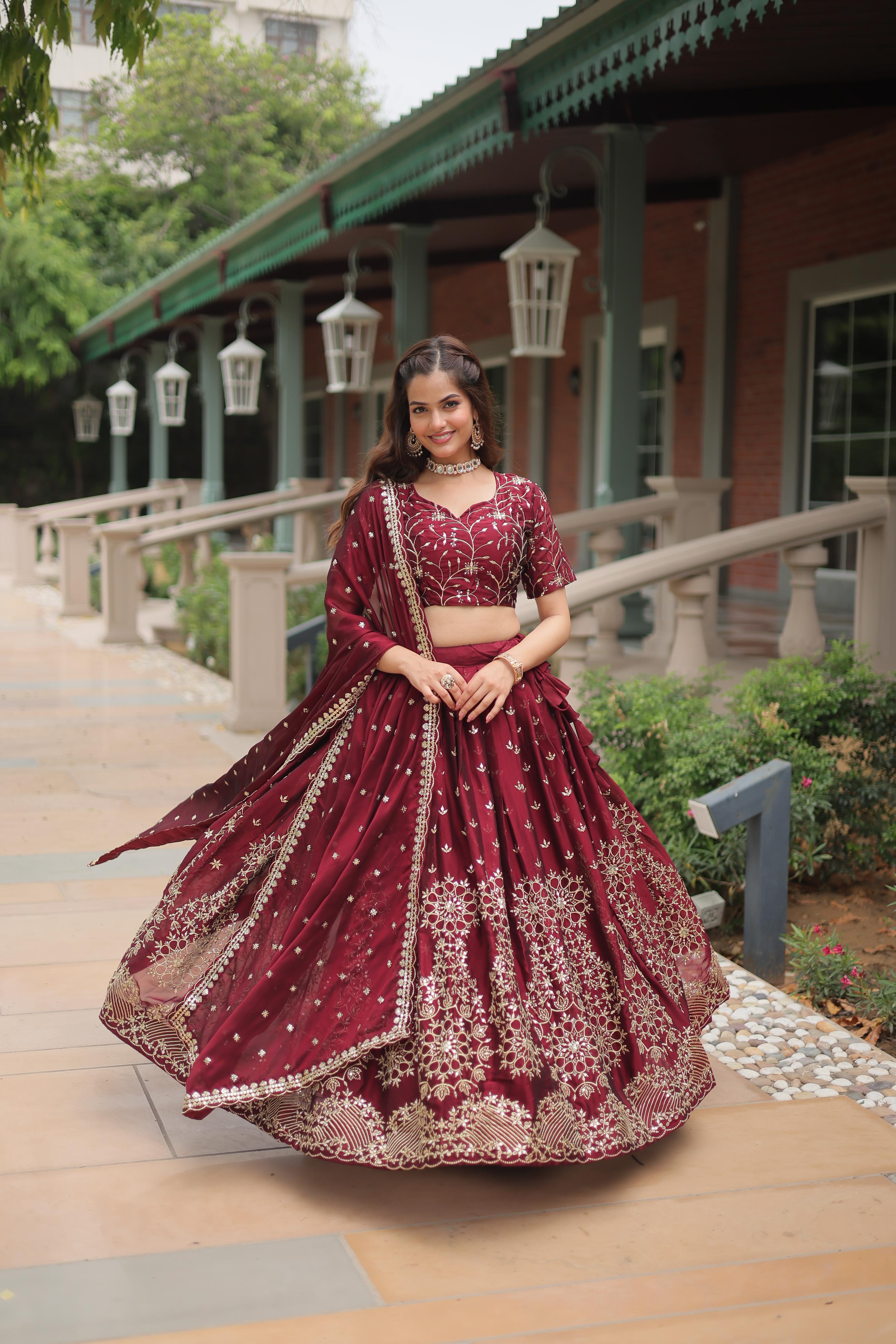 Party Wear Maroon Color Rangoli Silk With Heavy Sequins And Thread Embroidered Work Beautiful Lehenga Choli