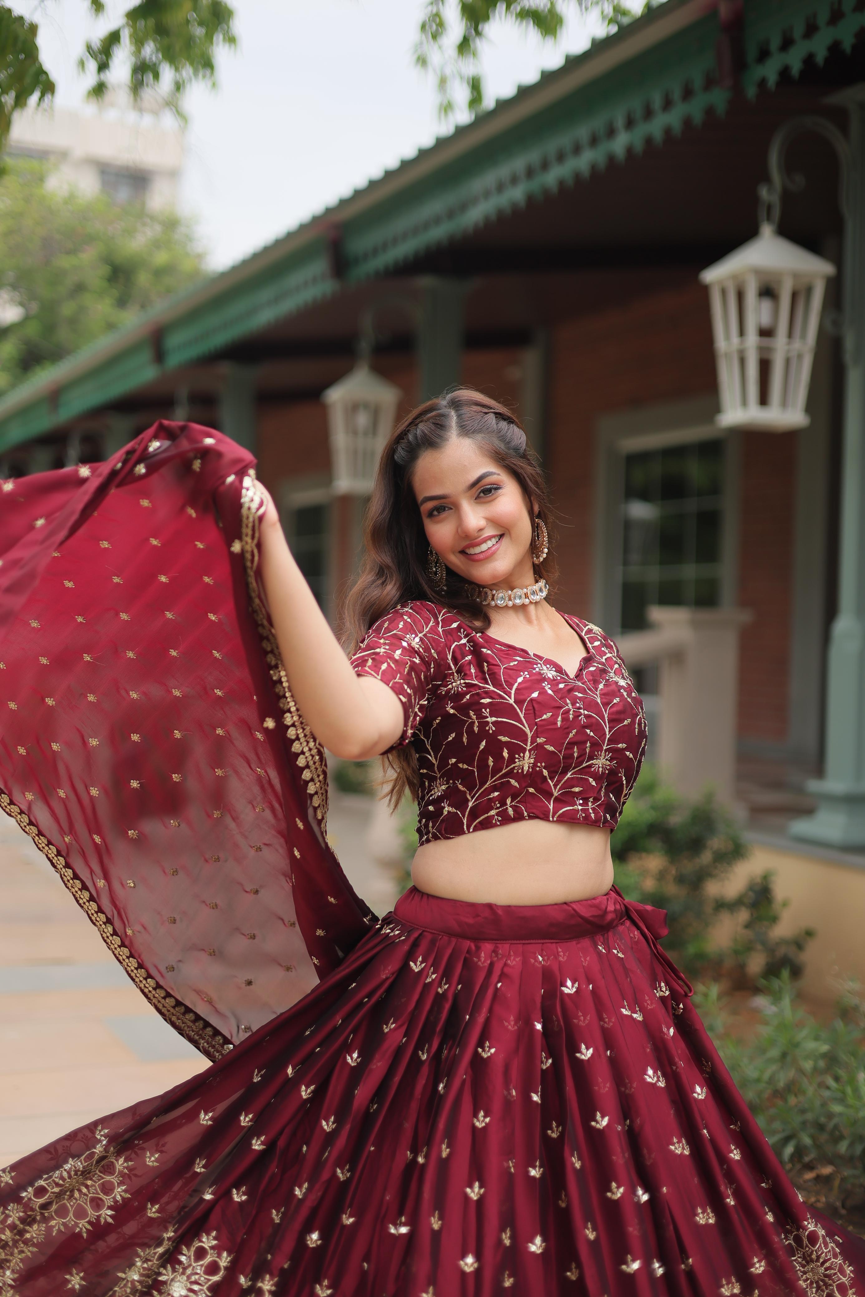 Party Wear Maroon Color Rangoli Silk With Heavy Sequins And Thread Embroidered Work Beautiful Lehenga Choli