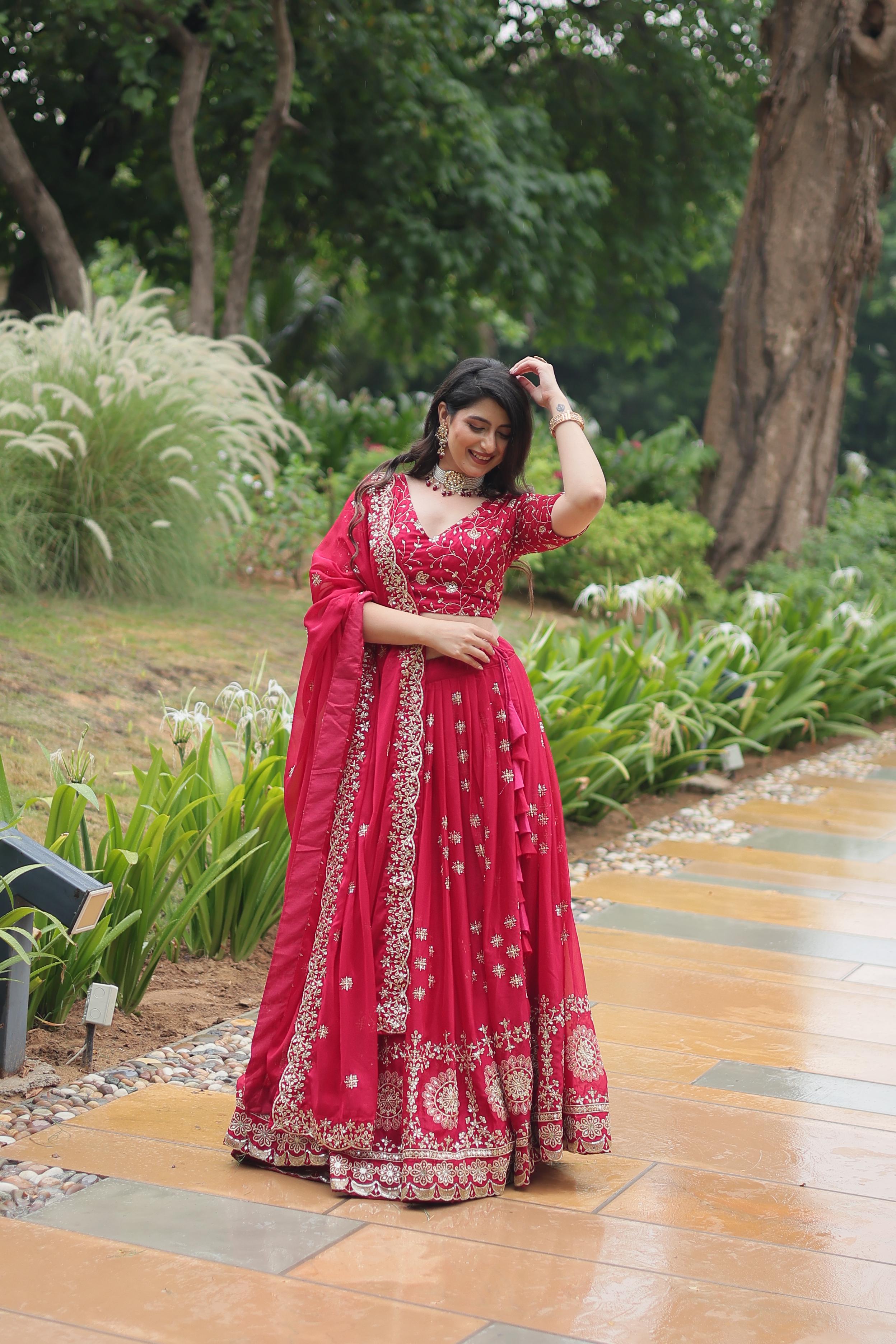 Stunning Pink Color Rangoli Silk With Heavy Sequins And Thread Embroidered Work Designer Lehenga Choli