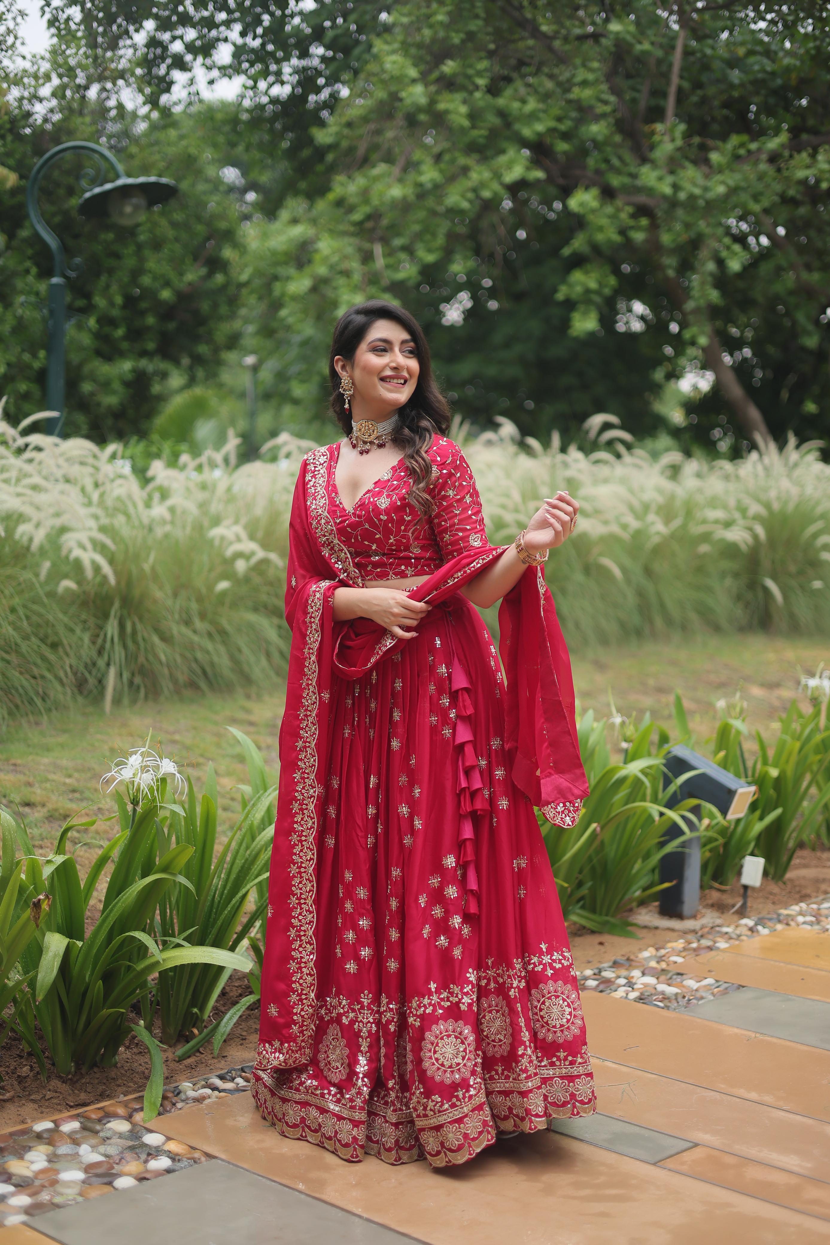 Stunning Pink Color Rangoli Silk With Heavy Sequins And Thread Embroidered Work Designer Lehenga Choli