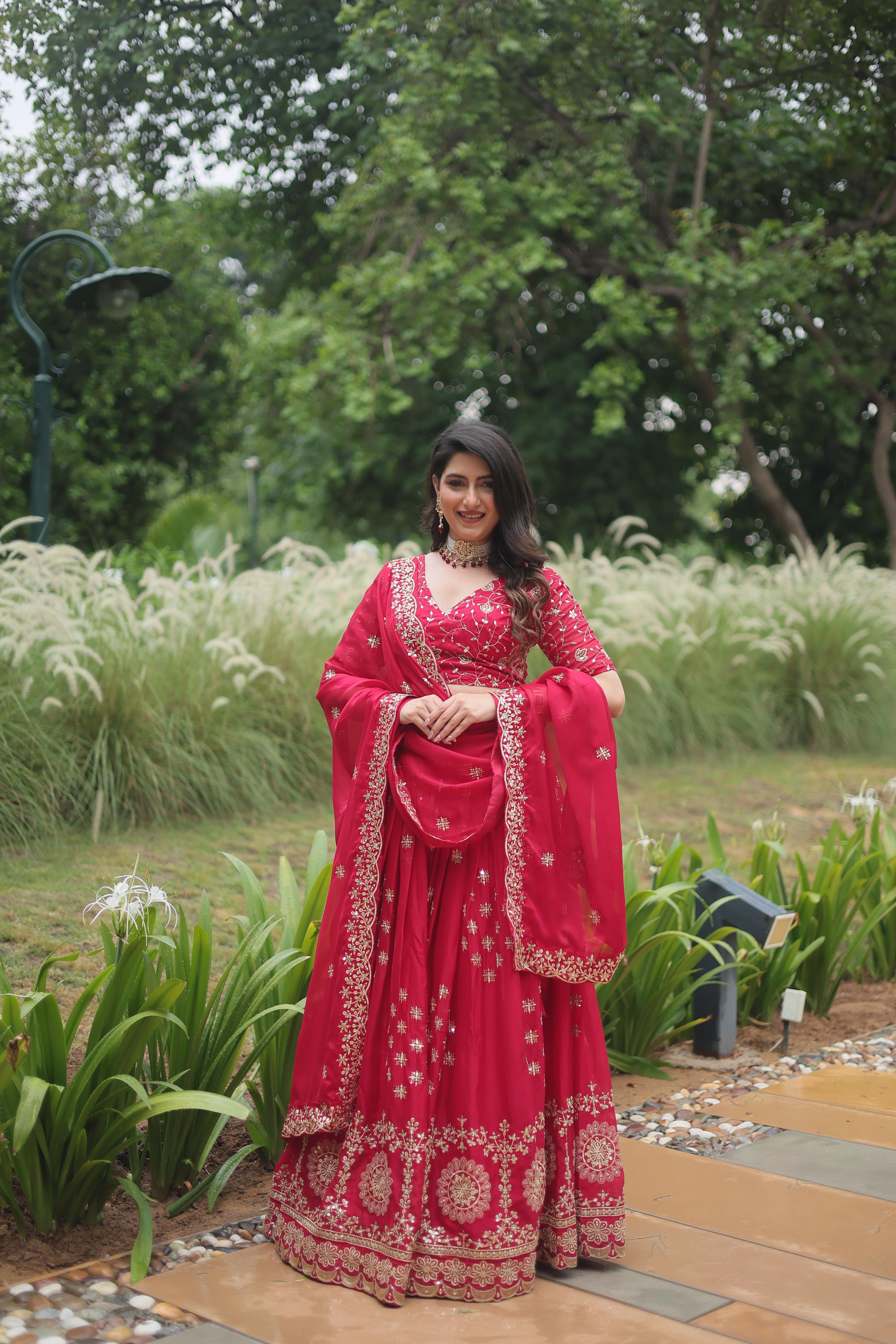 Stunning Pink Color Rangoli Silk With Heavy Sequins And Thread Embroidered Work Designer Lehenga Choli