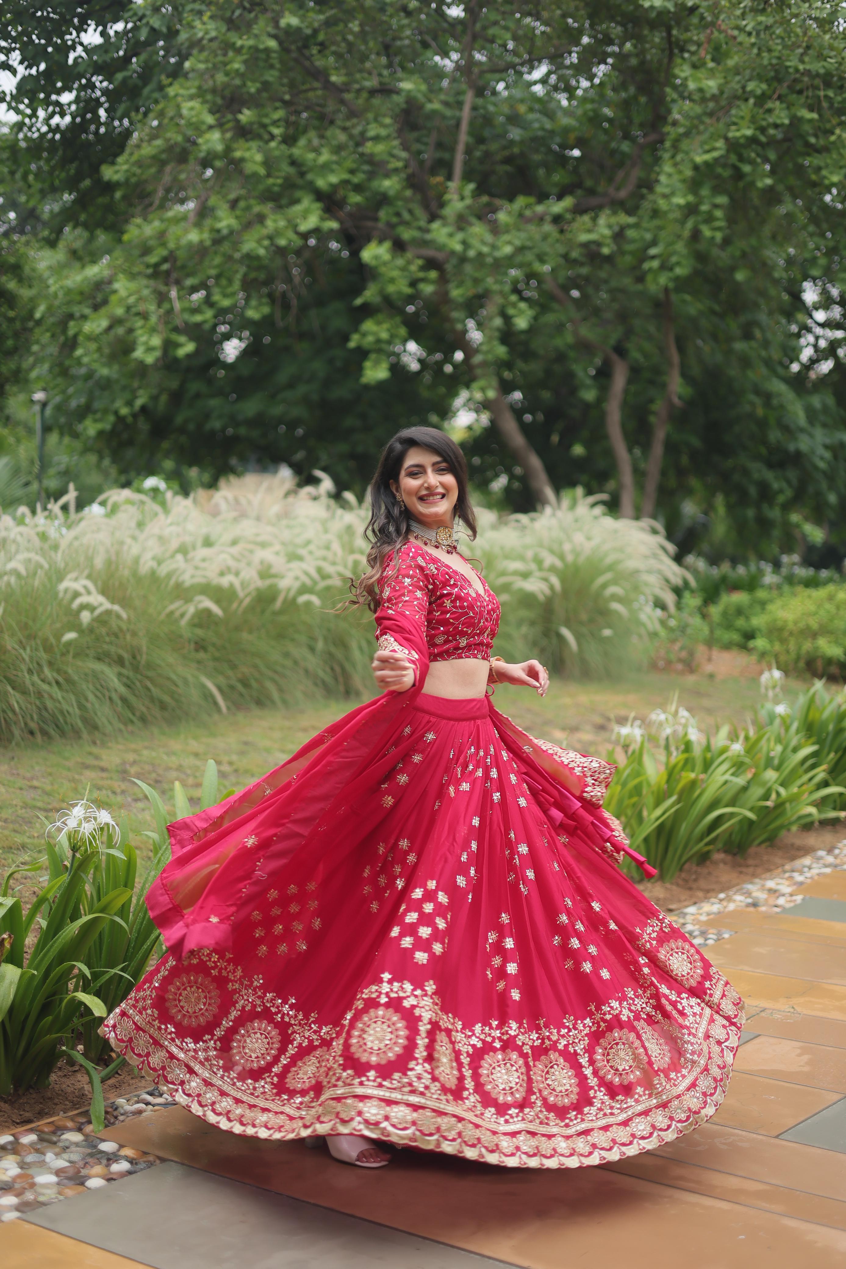 Stunning Pink Color Rangoli Silk With Heavy Sequins And Thread Embroidered Work Designer Lehenga Choli