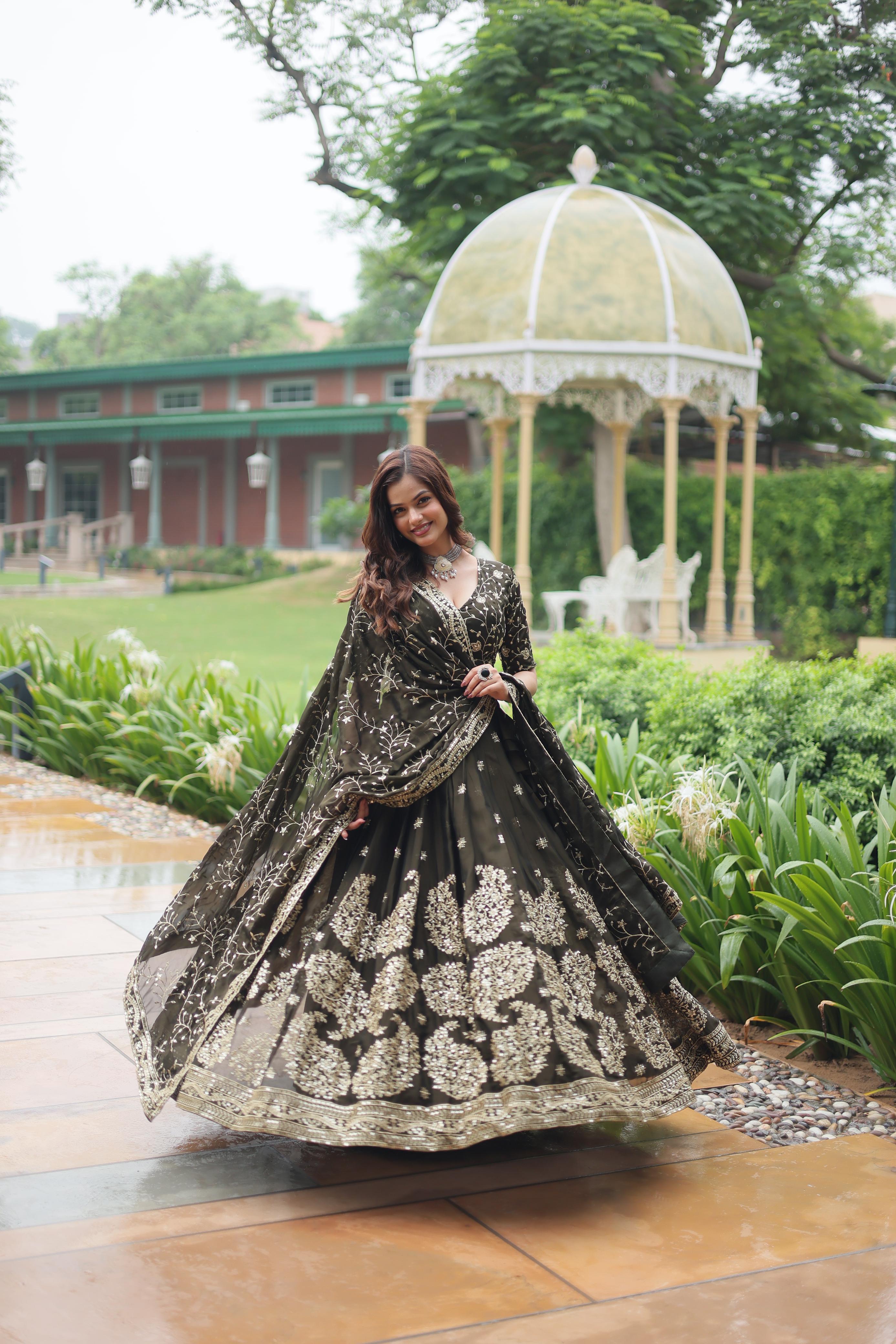 Celebrity Style Mahendi Green Color Rangoli Silk With Heavy Sequins With Thread Embroidered Work Beautiful Lehenga Choli