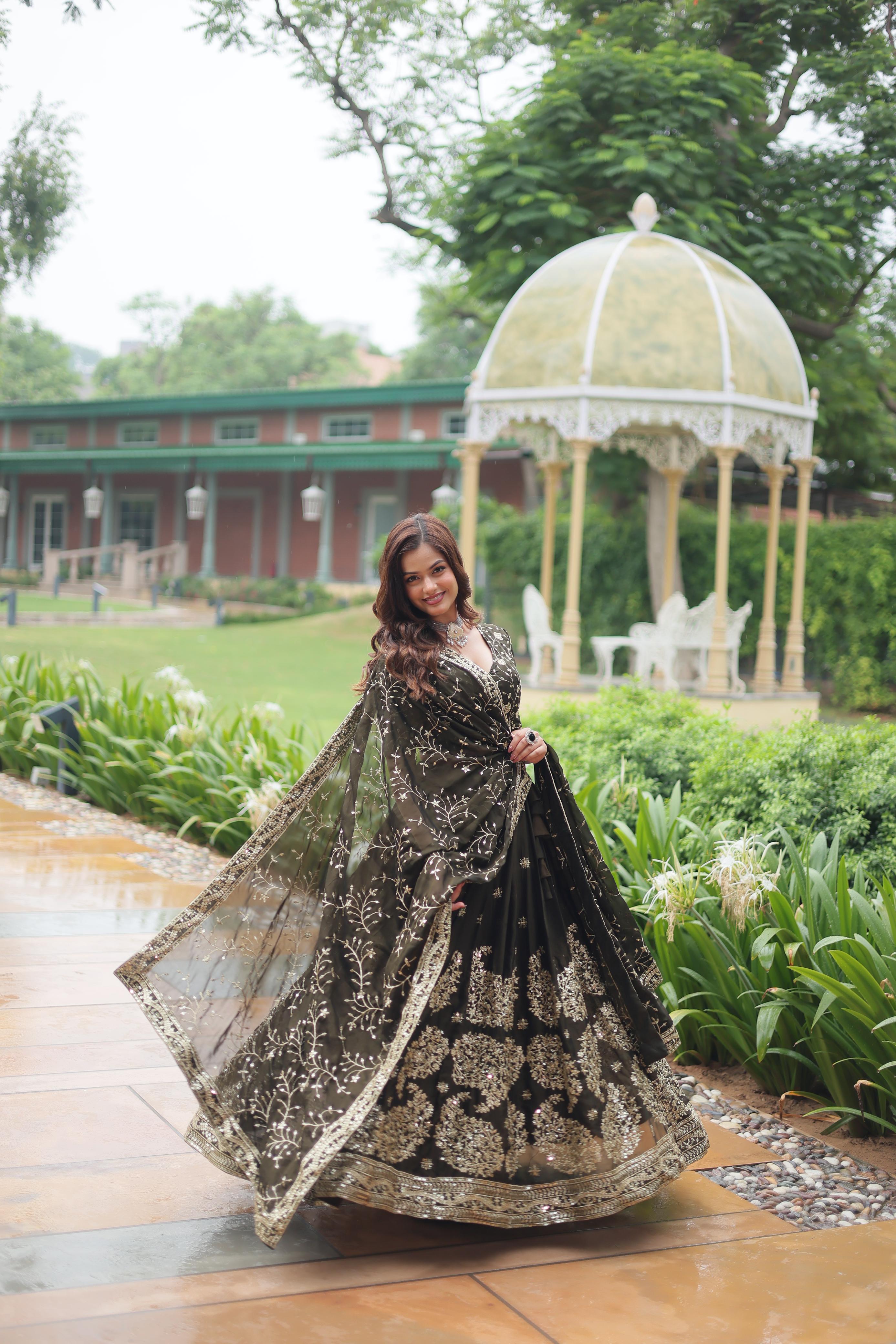 Celebrity Style Mahendi Green Color Rangoli Silk With Heavy Sequins With Thread Embroidered Work Beautiful Lehenga Choli