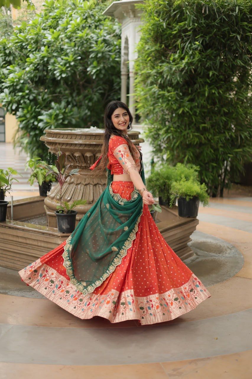 Ceremony Wear Orange Color Cosmos Jacquard Lehenga Choli With Russian Silk Embroidered Dupatta