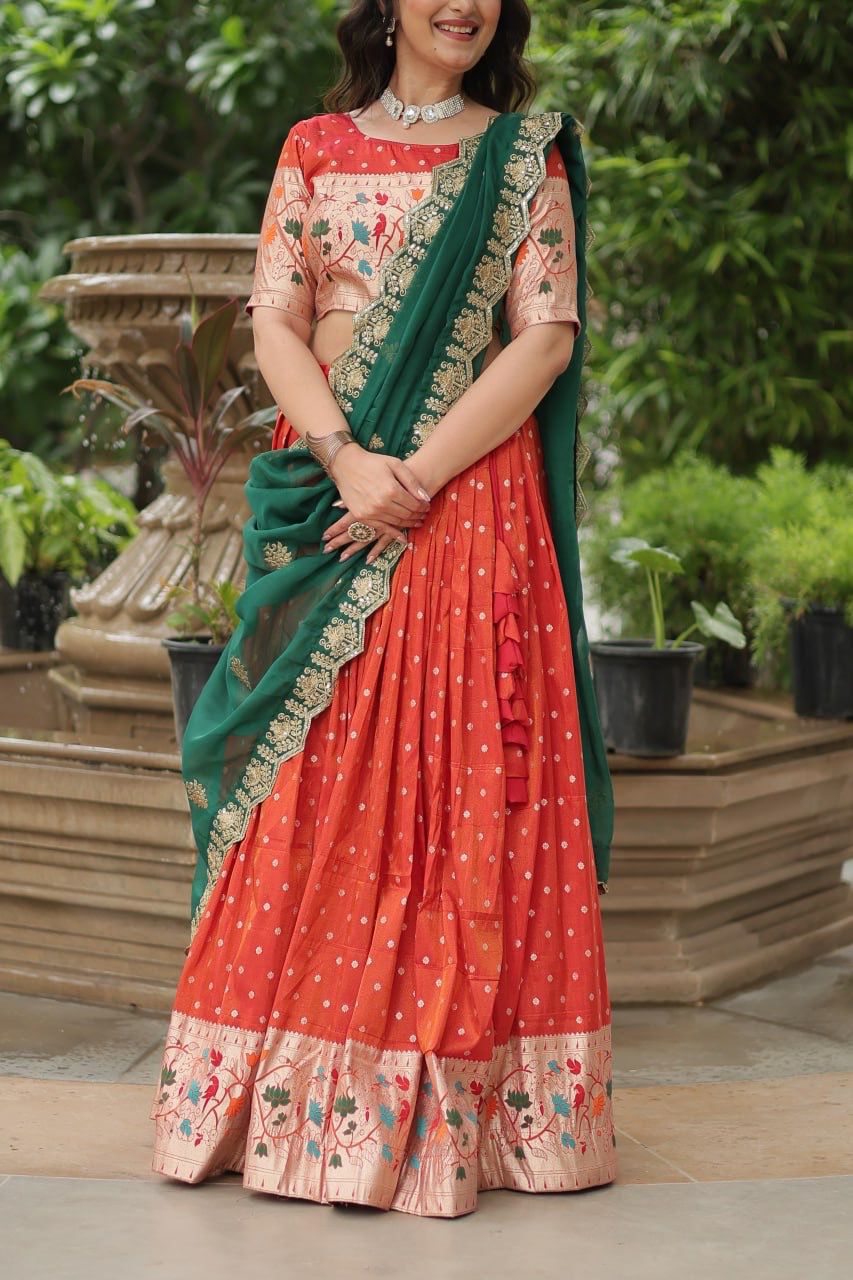 Ceremony Wear Orange Color Cosmos Jacquard Lehenga Choli With Russian Silk Embroidered Dupatta