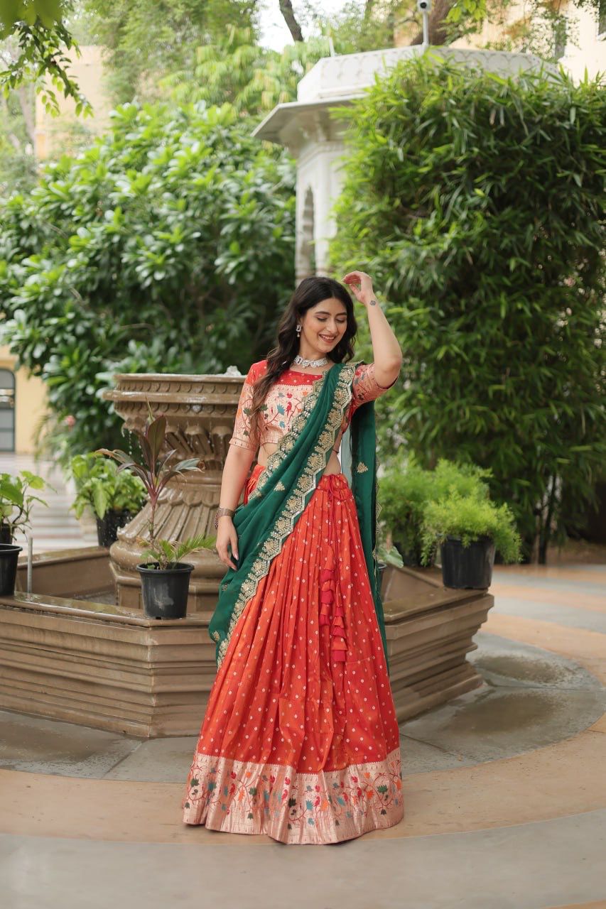 Ceremony Wear Orange Color Cosmos Jacquard Lehenga Choli With Russian Silk Embroidered Dupatta