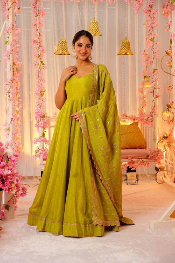 Glimmering Mustard Color Heavy Roman Silk With Fancy Lace Designer Gown