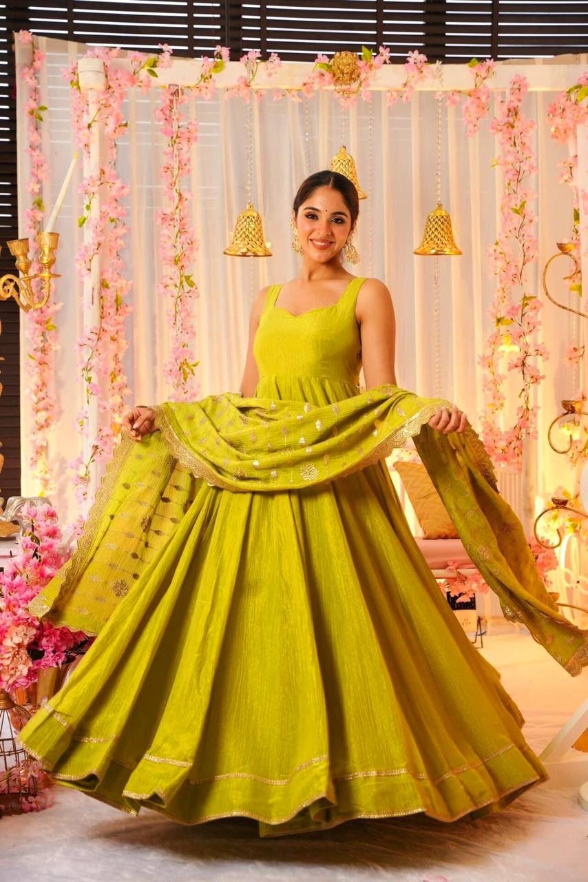 Glimmering Mustard Color Heavy Roman Silk With Fancy Lace Designer Gown