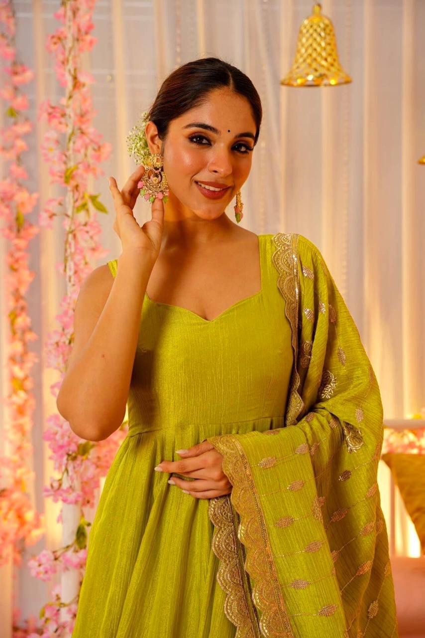 Glimmering Mustard Color Heavy Roman Silk With Fancy Lace Designer Gown