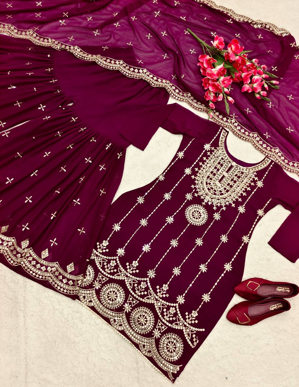 Flattering Embroidered Wine Color Sharara Suit