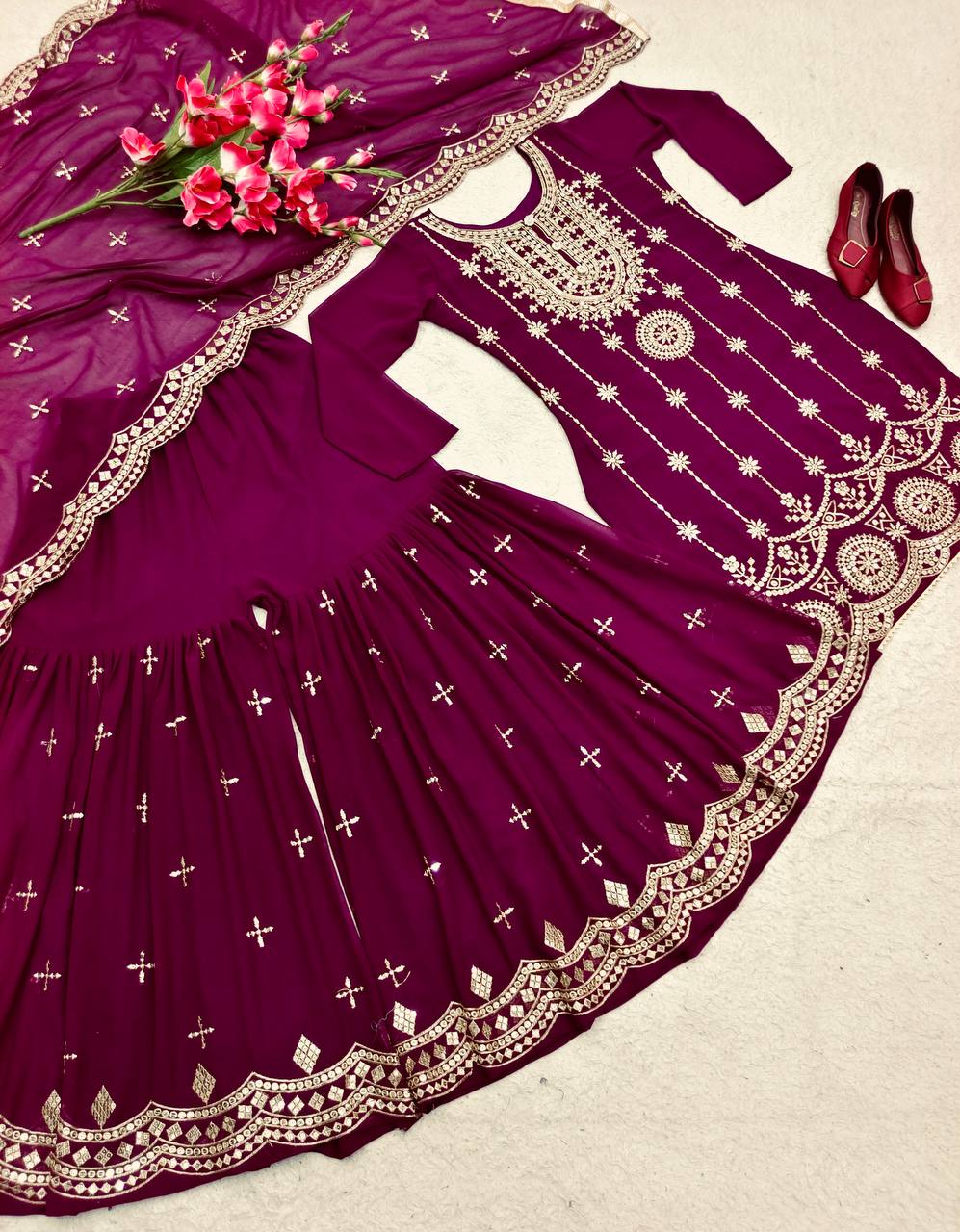 Flattering Embroidered Wine Color Sharara Suit