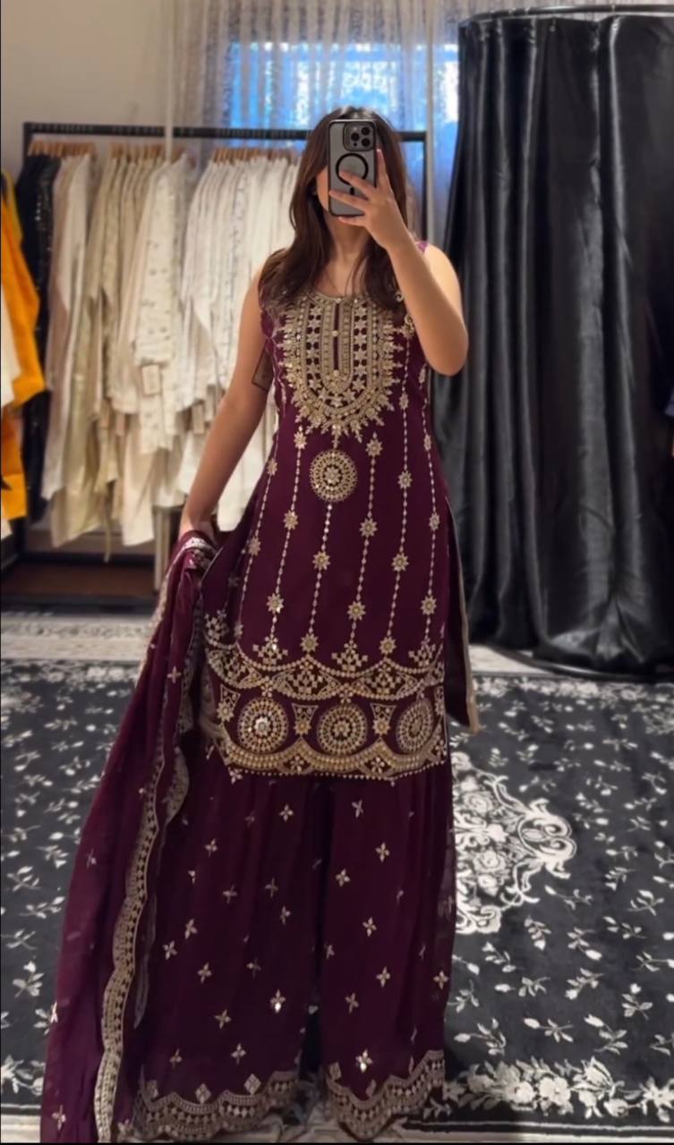 Flattering Embroidered Wine Color Sharara Suit