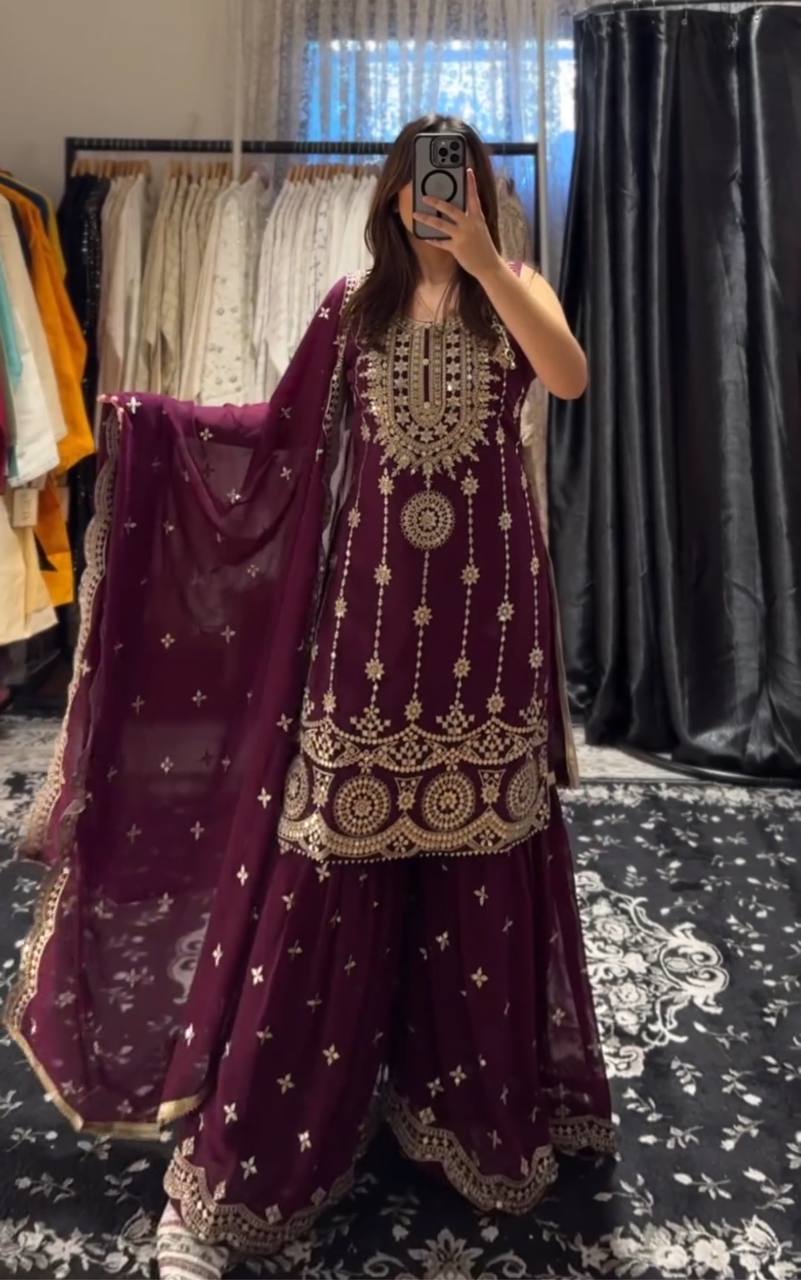 Flattering Embroidered Wine Color Sharara Suit