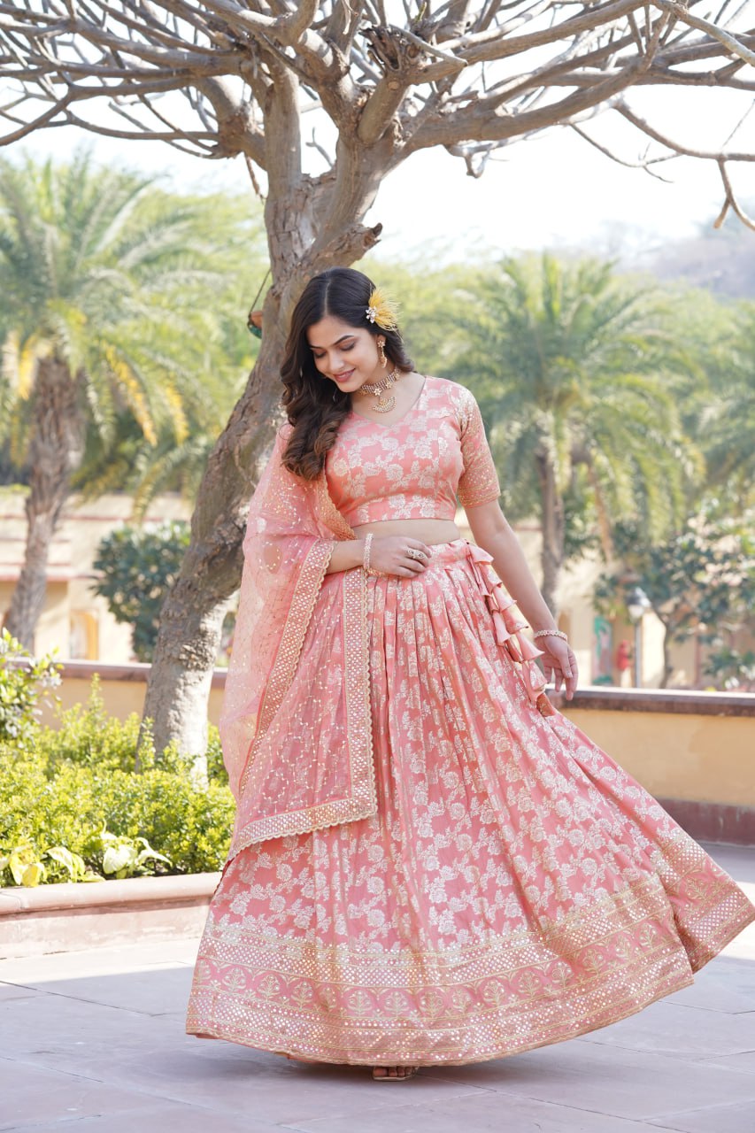 Flattering Peach Color Jacquard Embroidered Lehenga Choli